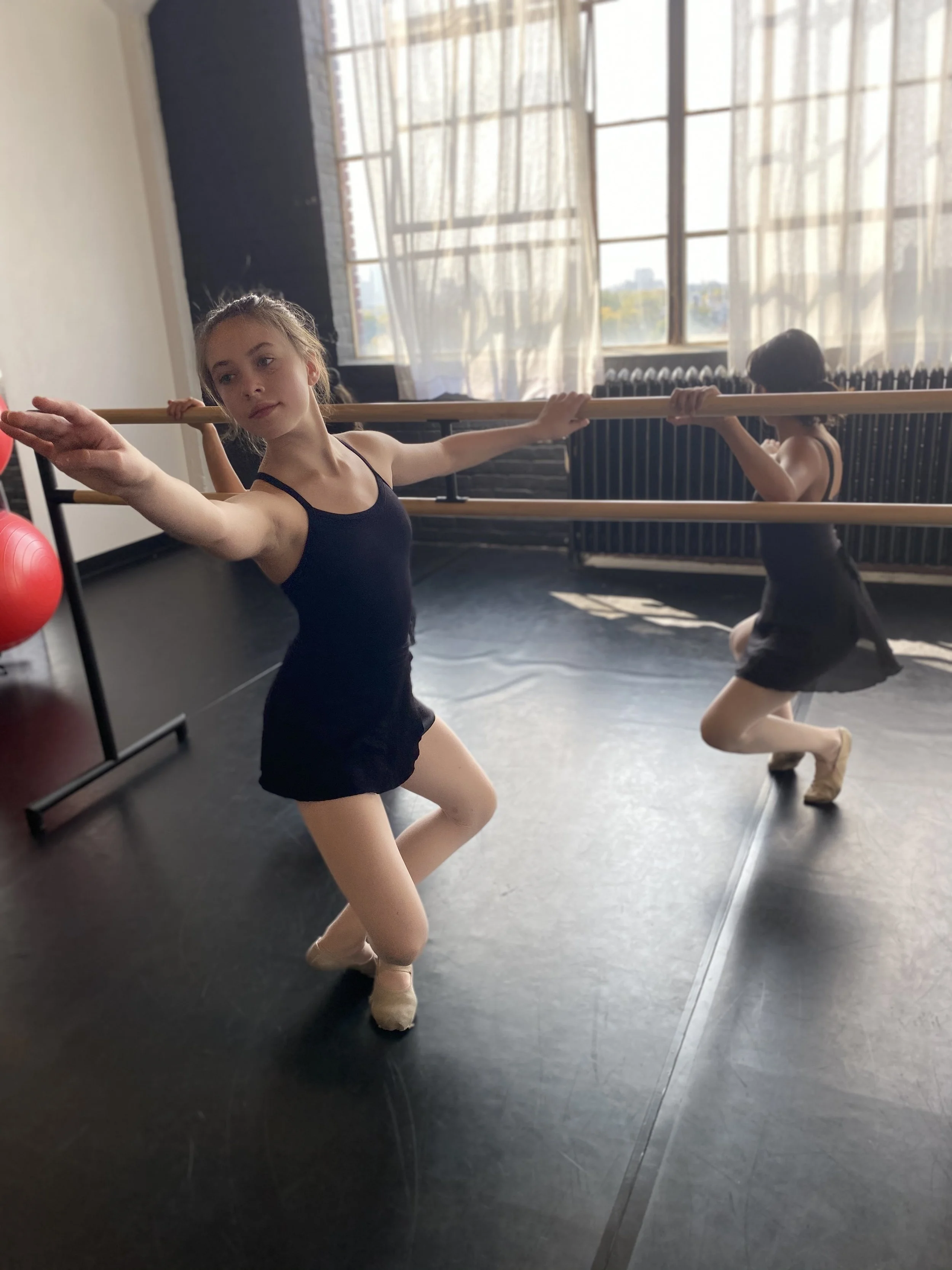 barre plié window black floor Dance acting ballet jazz lyrical contemporary theater musical camp singing voice glee club Amber Keeley director Mpls classes twin cities workshops Spring Dance Theatre Academy NE Minneapolis MN St St. Saint Paul Minneso