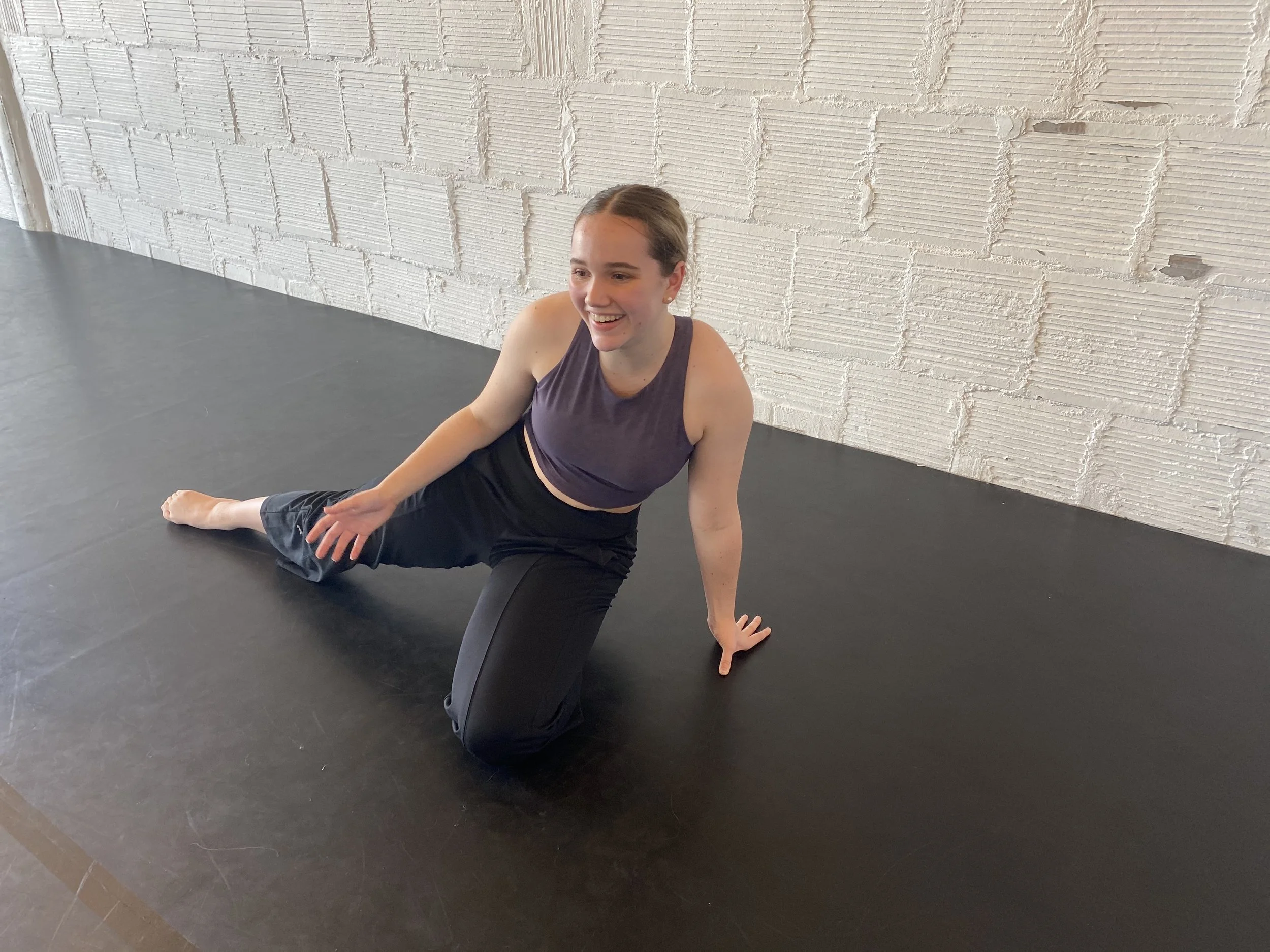 stretching purple top laughing Dance acting ballet jazz lyrical contemporary theater musical camp singing voice glee club Amber Keeley director Mpls classes twin cities workshops Spring Dance Theatre Academy NE Minneapolis MN St St. Saint Paul Minnes