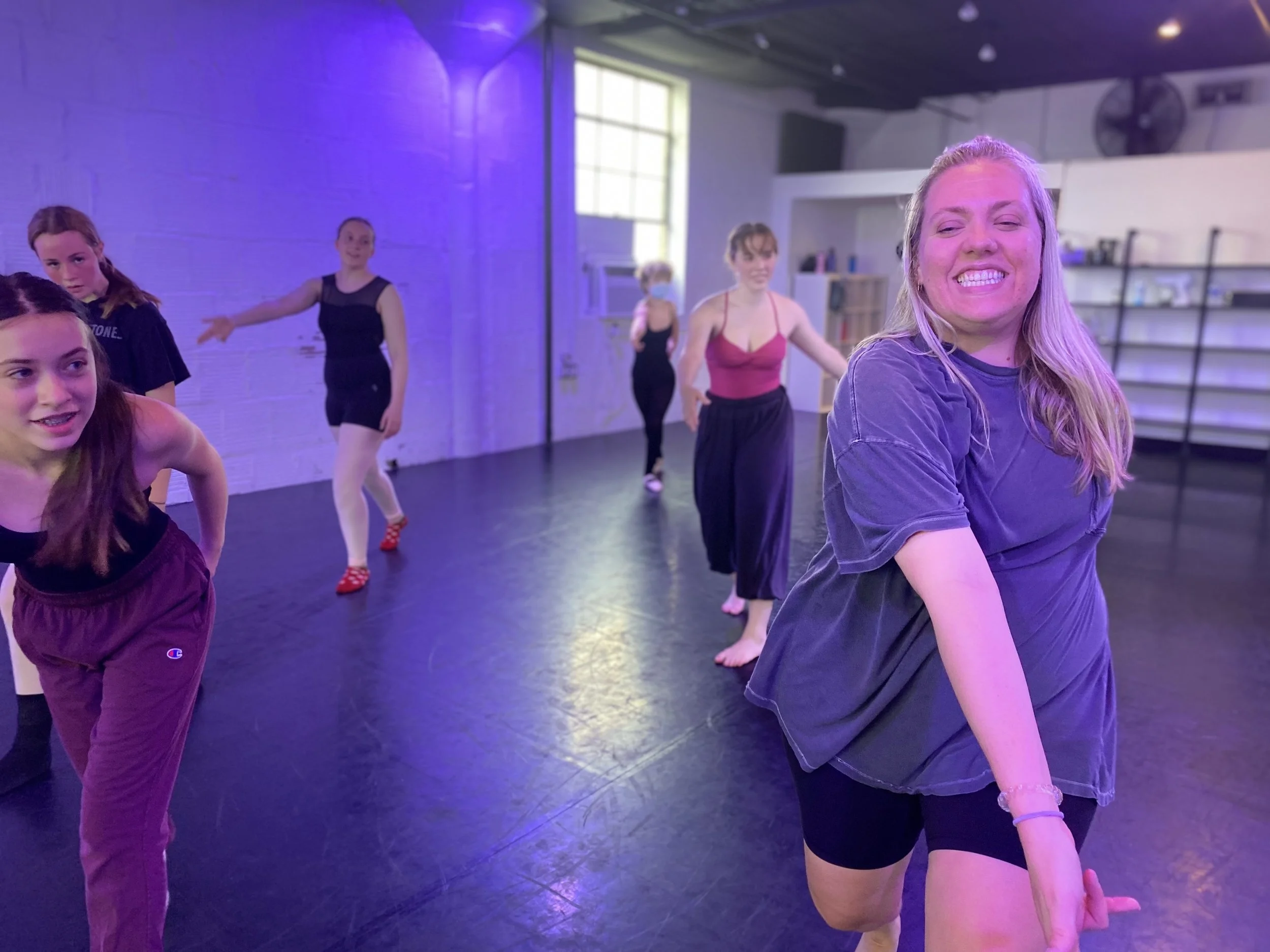 Rachel Doran purple lights mood window pink leotard maroon pants  Dance dancer studio acting ballet jazz lyrical contemporary theater musical camp singing voice glee club Amber Keeley director Mpls classes twin cities workshops Spring Dance Theatre A