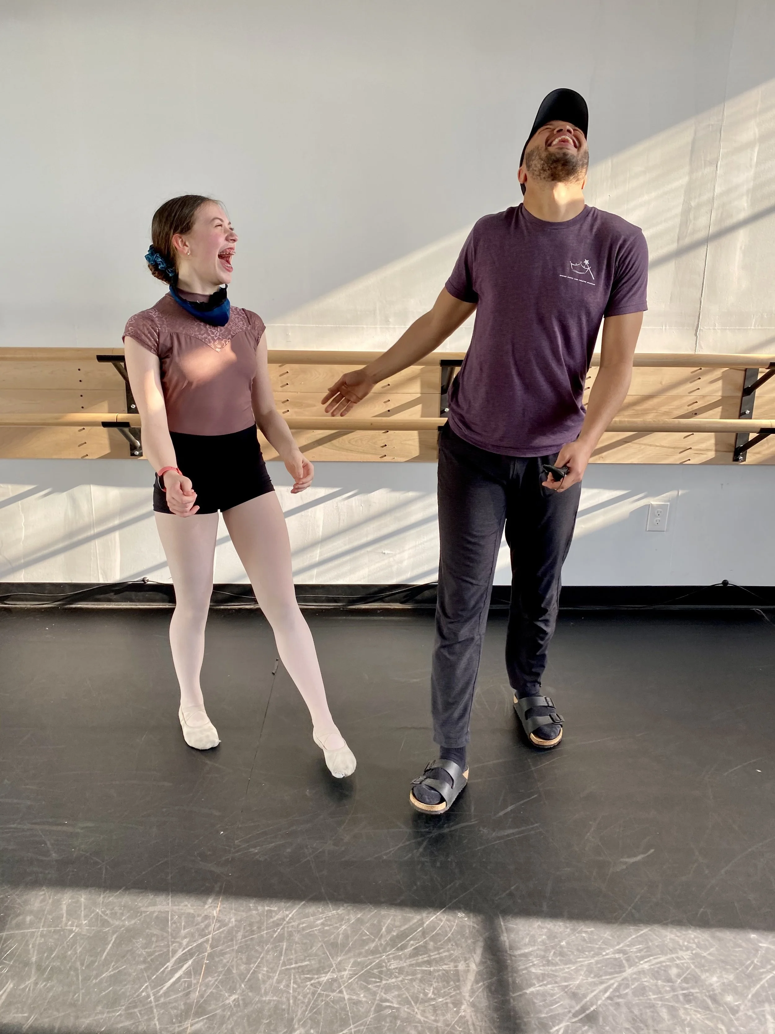laughing Jeff Robinson barre white wall black floor