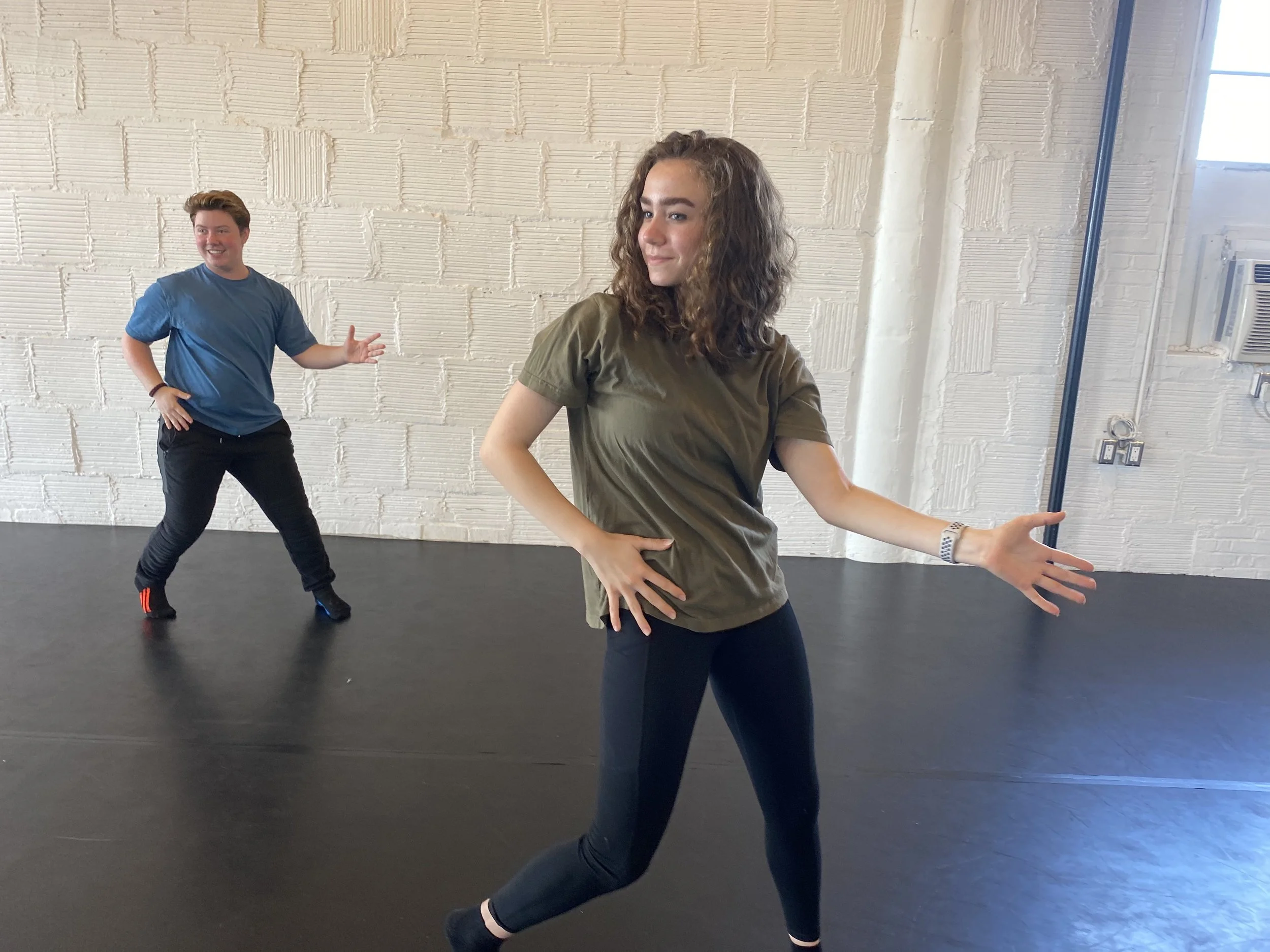  musical theater dance jazz hands blue shirt boy green shirt girl Dance acting ballet jazz lyrical contemporary theater musical camp singing voice glee club Amber Keeley director Mpls classes twin cities workshops Spring Dance Theatre Academy NE Minn