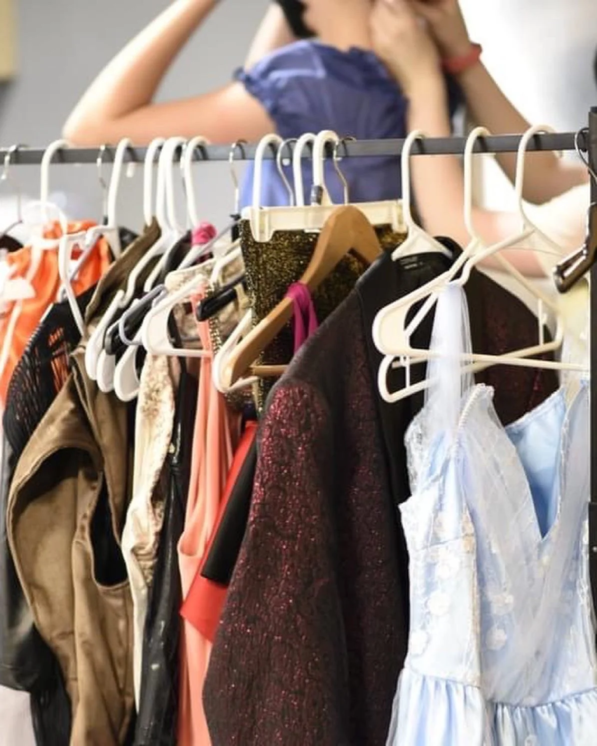 costumes rack hangers blue dress helping getting ready Sherri Stewart Dance dancer studio acting ballet jazz lyrical contemporary theater musical camp singing voice glee club Amber Keeley director Mpls classes twin cities workshops Spring Dance Theat