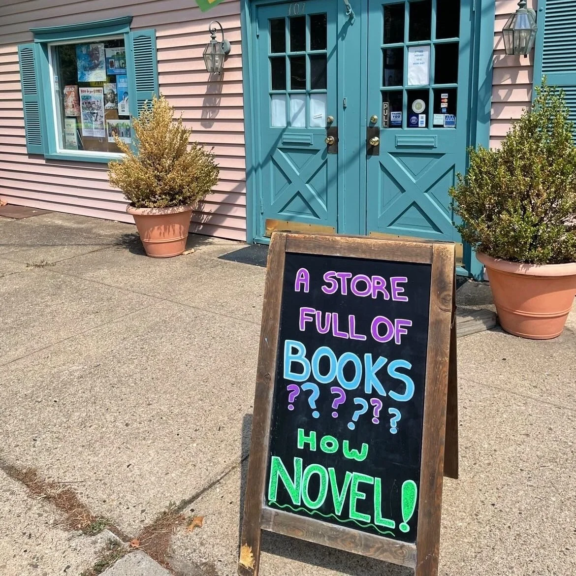 The Bookworm absolutely nailed it with these sidewalk signs — Visit