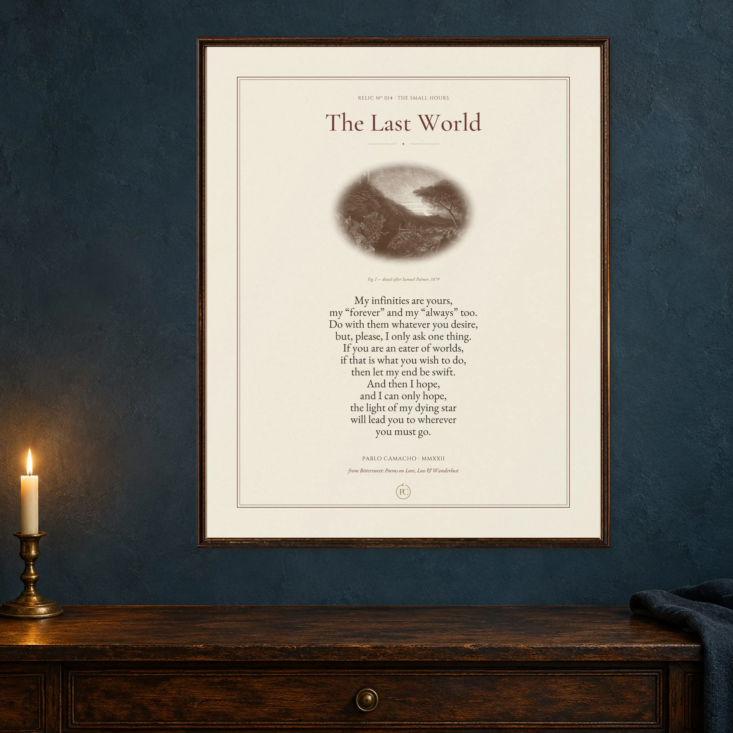 The Last World poetry print with a moonlit landscape etching, framed on a midnight-blue wall by candlelight