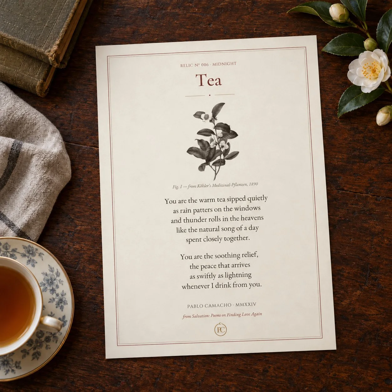 Tea 8×10 poetry print lying unframed on a wooden desk beside a cup of tea