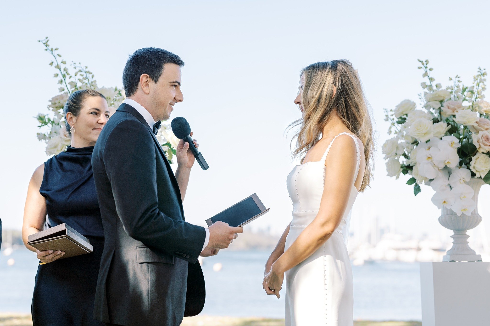 I'll focus on the microphone... so you can focus on the love of your life.

All of my packages come with top-quality sound equipment included at no extra cost. From the smallest legals-only style ceremony, to an epic celebration of love with all your