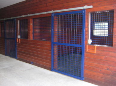 Blue powder-coated hose stall door