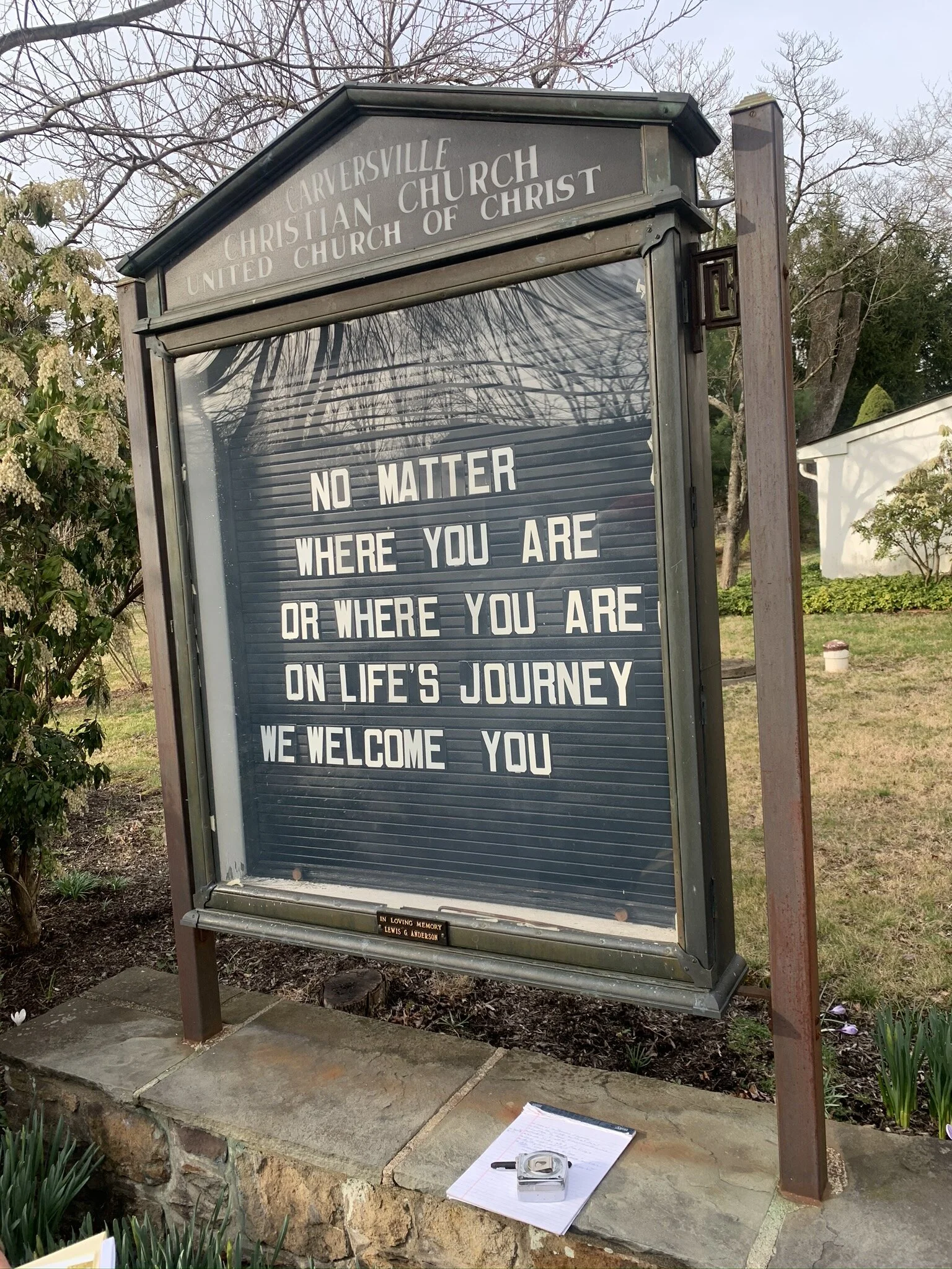 Sign outside Carversville Christian Church with a message: 'No matter where you are or where you are on life's journey, we welcome you.'