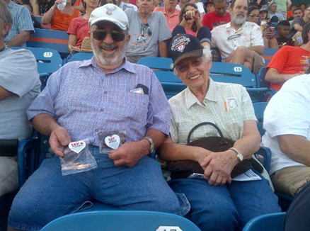 Two people holding heart shapped brownies at San Jose Giants Excite Ballpark (Copy)