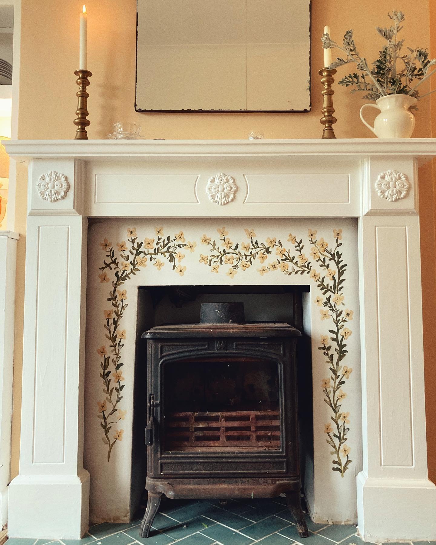 There&rsquo;s nothing that gives me more pleasure than painting the fire place. I&rsquo;m not sure why.
This months is a made up flower.  I used the same yellow I did for the walls. 

.
.
.
.
.
.
.
.
.
.
.
.
#fireplace #painting #wallart #interiordes