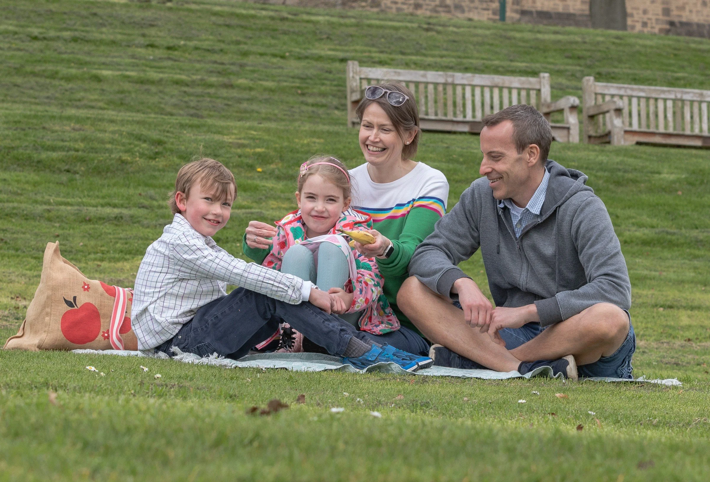 Family having a picnic on the lawn