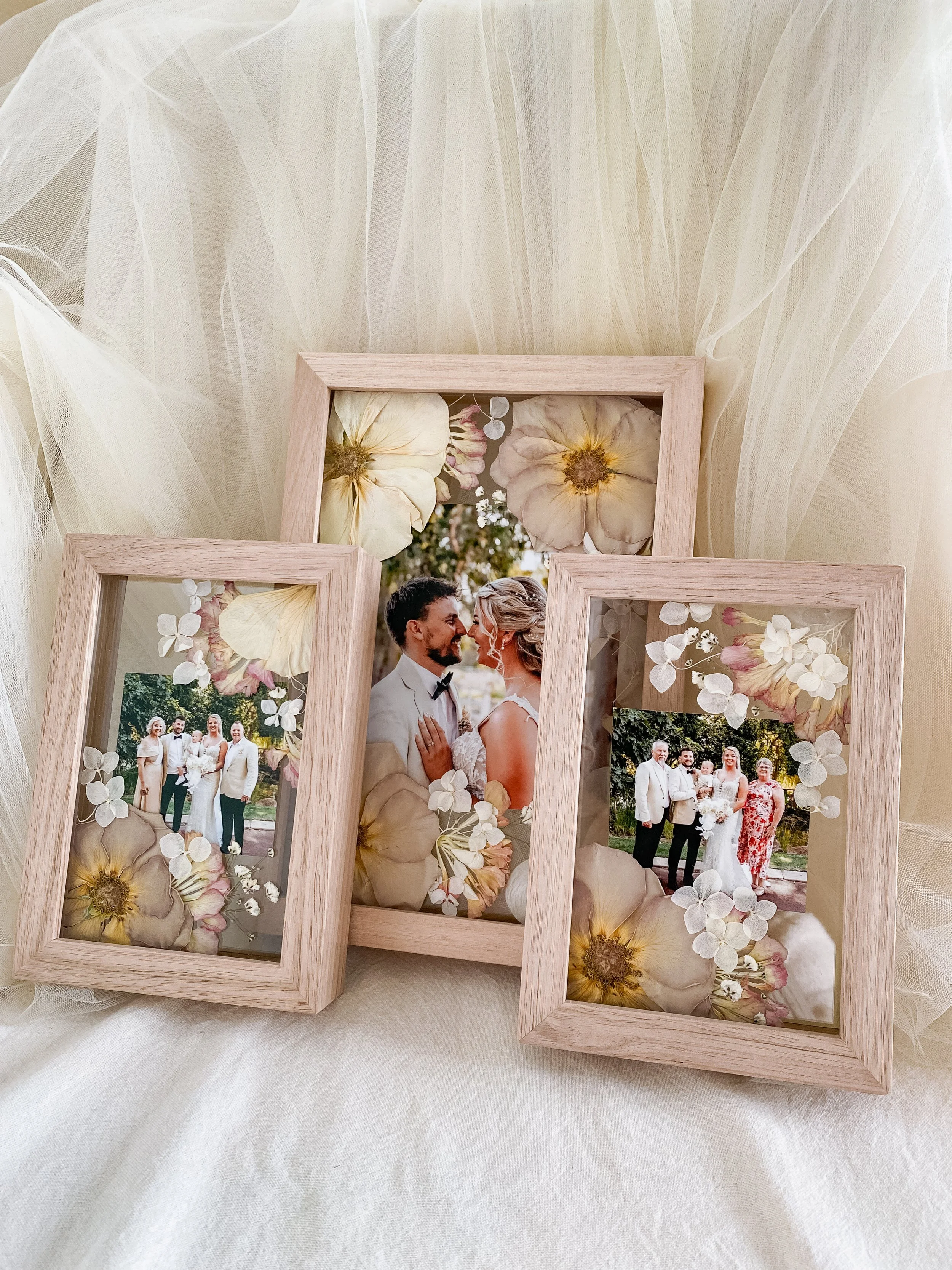 set-of-3-custom-frames-with-pictures-pressed-wedding-flowers.JPG