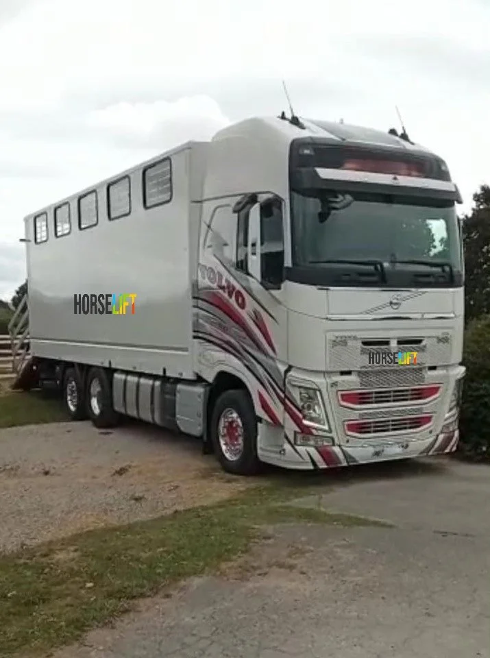 Trsp. 151 White Truck Front Side.jpg