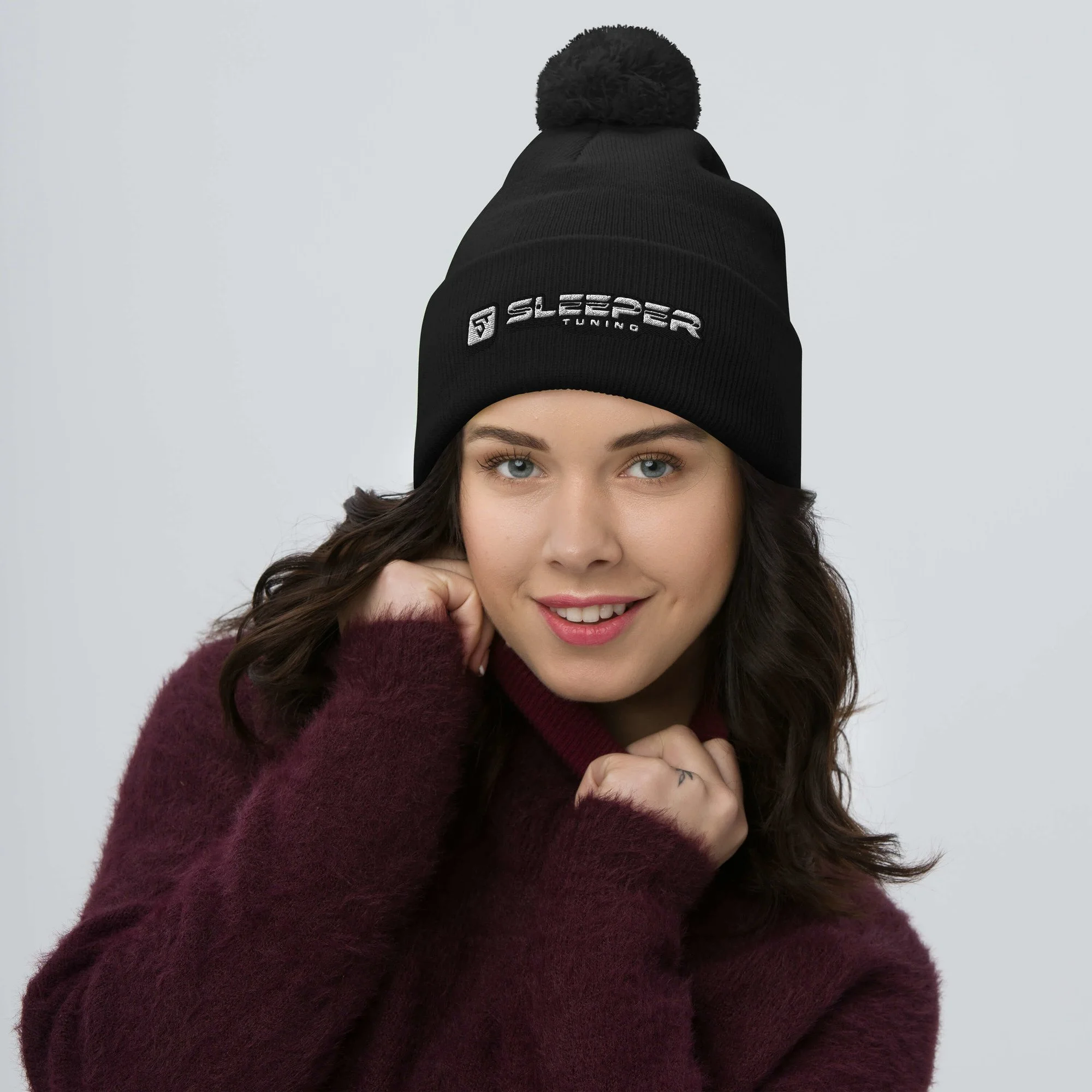 pom-pom-knit-cap-black-front-68a89b5173947.jpg