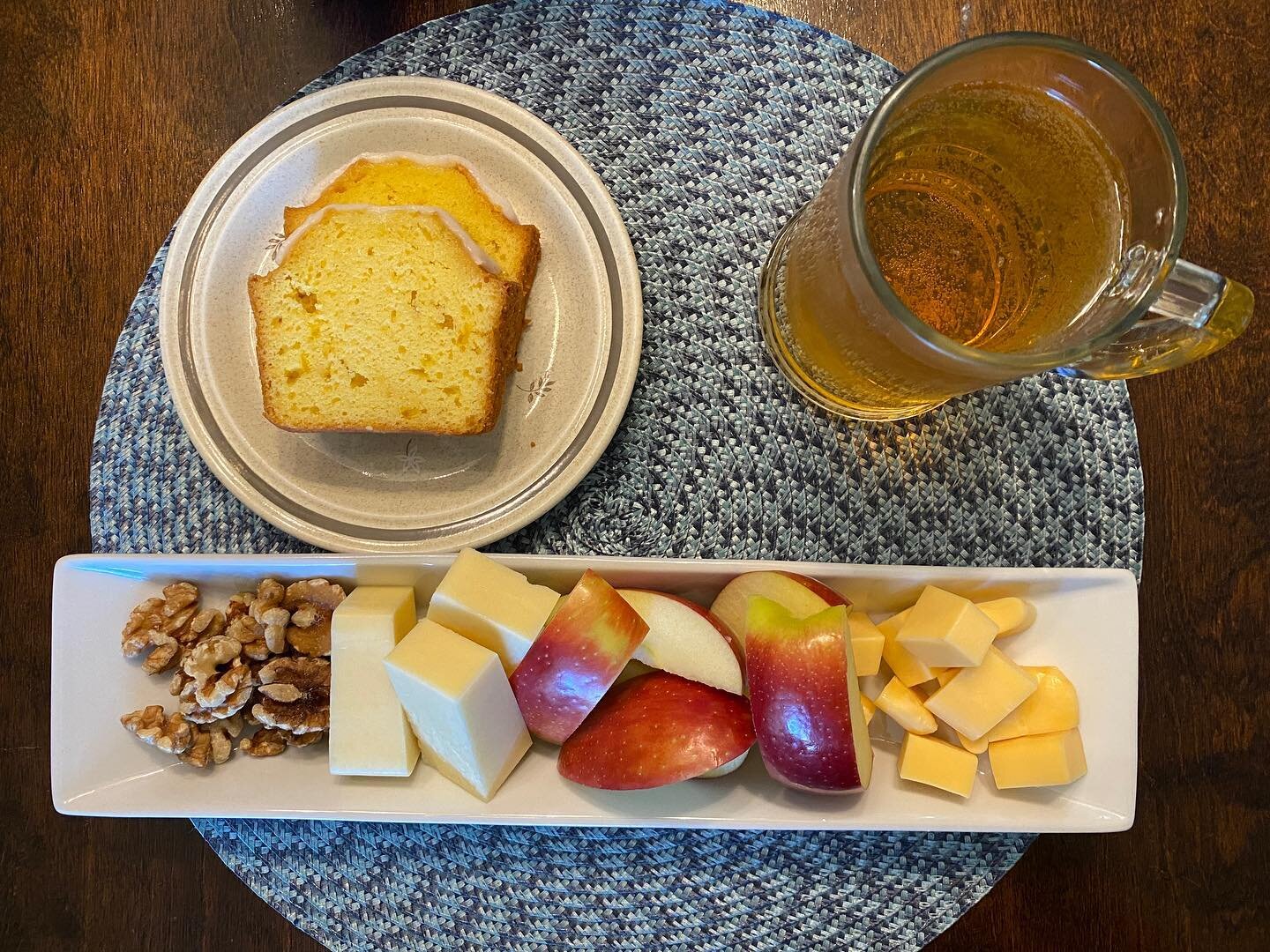 #hobbitday2022 
Elevenses: (standing in for honey cakes) lemon cakes, apple cider, walnuts, aged cheddar, apples, and smoked Gouda. 
#eatlikeahobbit
#elevenses