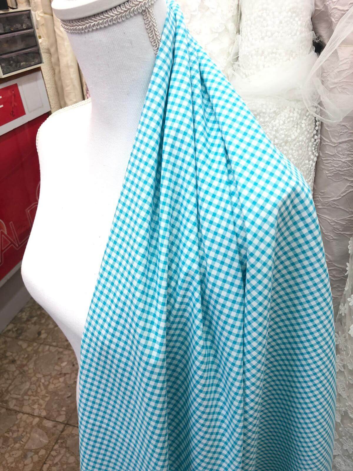 Turquoise printed poplin fabric coupon - presentation