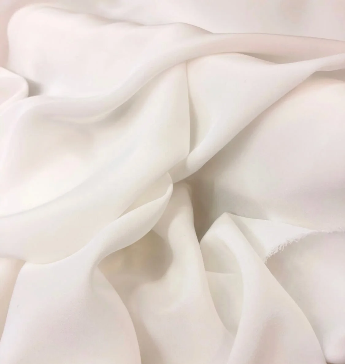 Tissu Crêpe de soie blanc - drapé