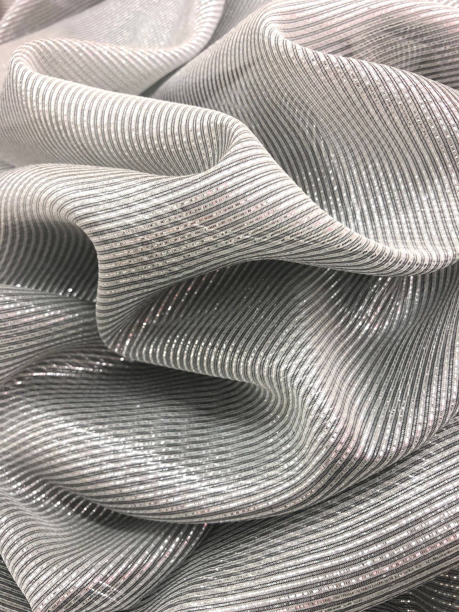 Silver silk lamé with draped zoom stripes
