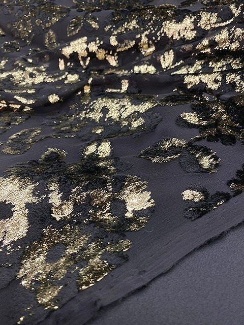 Tissu Sequin doré sur velours noir