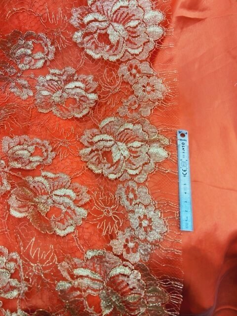 Dentelle De Calais En Polyamide Orangé Brique - Reste De Mercerie 100cm X 8.5cm, Motif Floral
