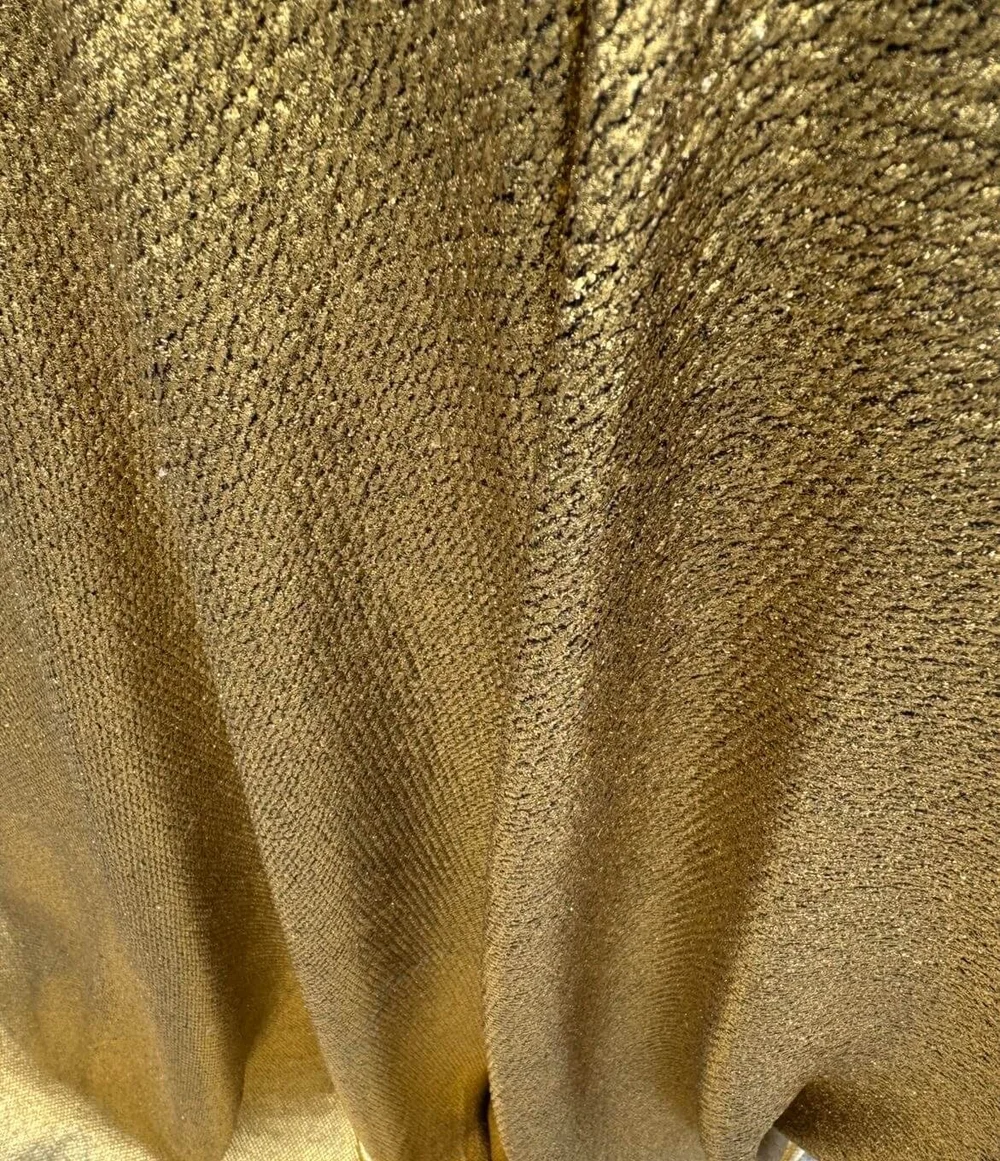 Black knitted fabric coupon with gold lamination - Generaldiff