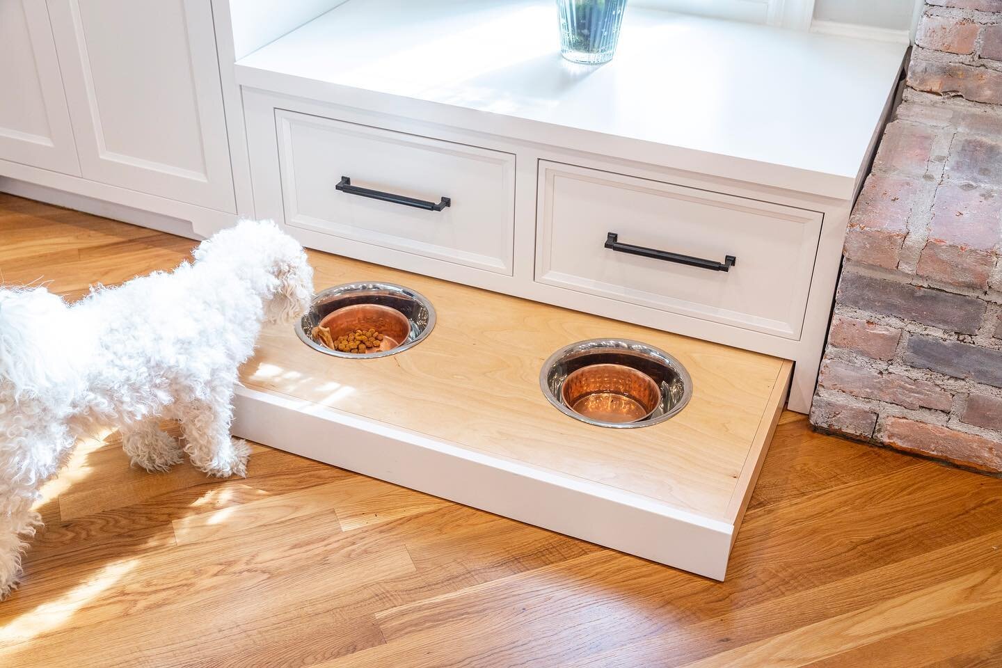 Who says doggies don&rsquo;t love custom cabinetry too?! This project was so fun. We created a functional spot for Cloud&rsquo;s bowls that are the perfect height for him and tuck away neatly when not in use. Just in time for the dog days of summer! 