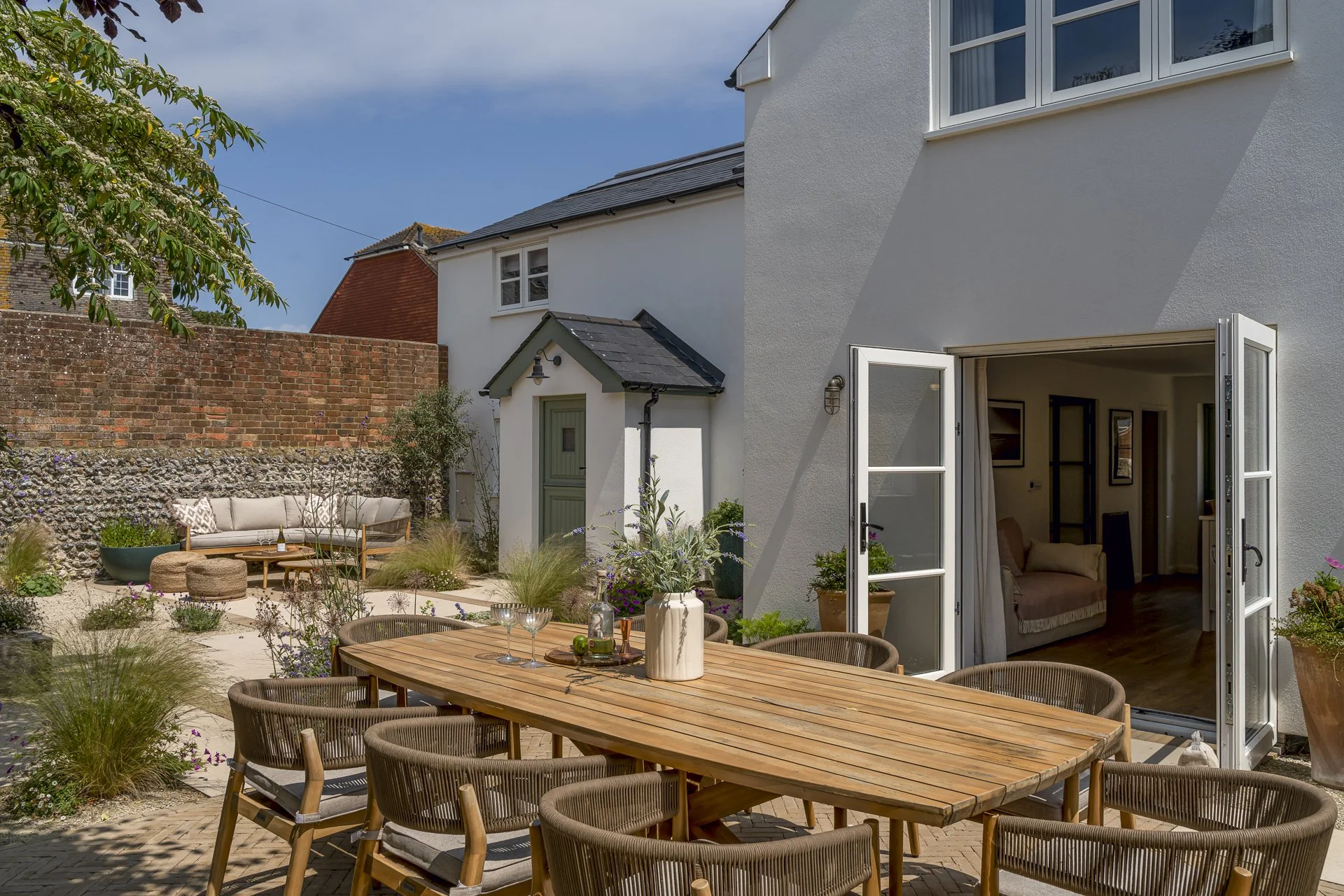 Coastal garden, drought tolerant planting, bespoke paving, zoned garden areas, courtyard garden, cottage redesign