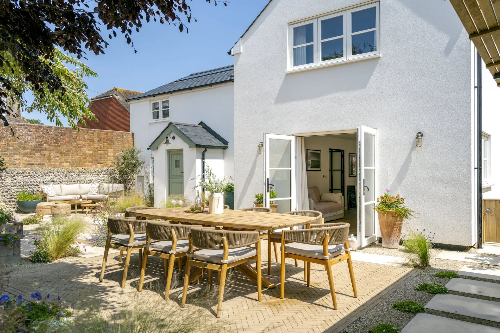 Coastal garden, drought tolerant planting, bespoke paving, zoned garden areas, courtyard garden