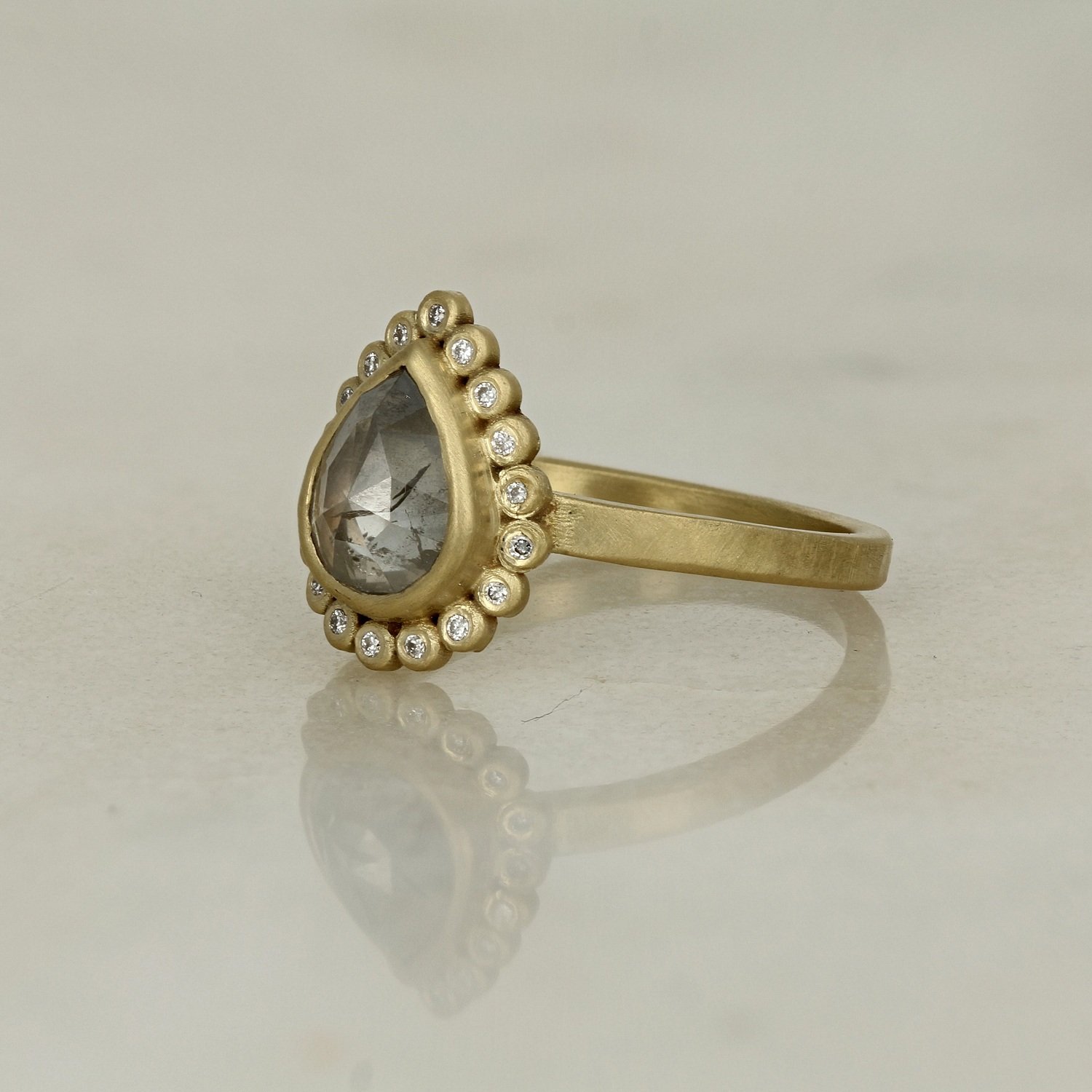 18k yellow gold brushed finish grey diamond pear shape halo accented ring
