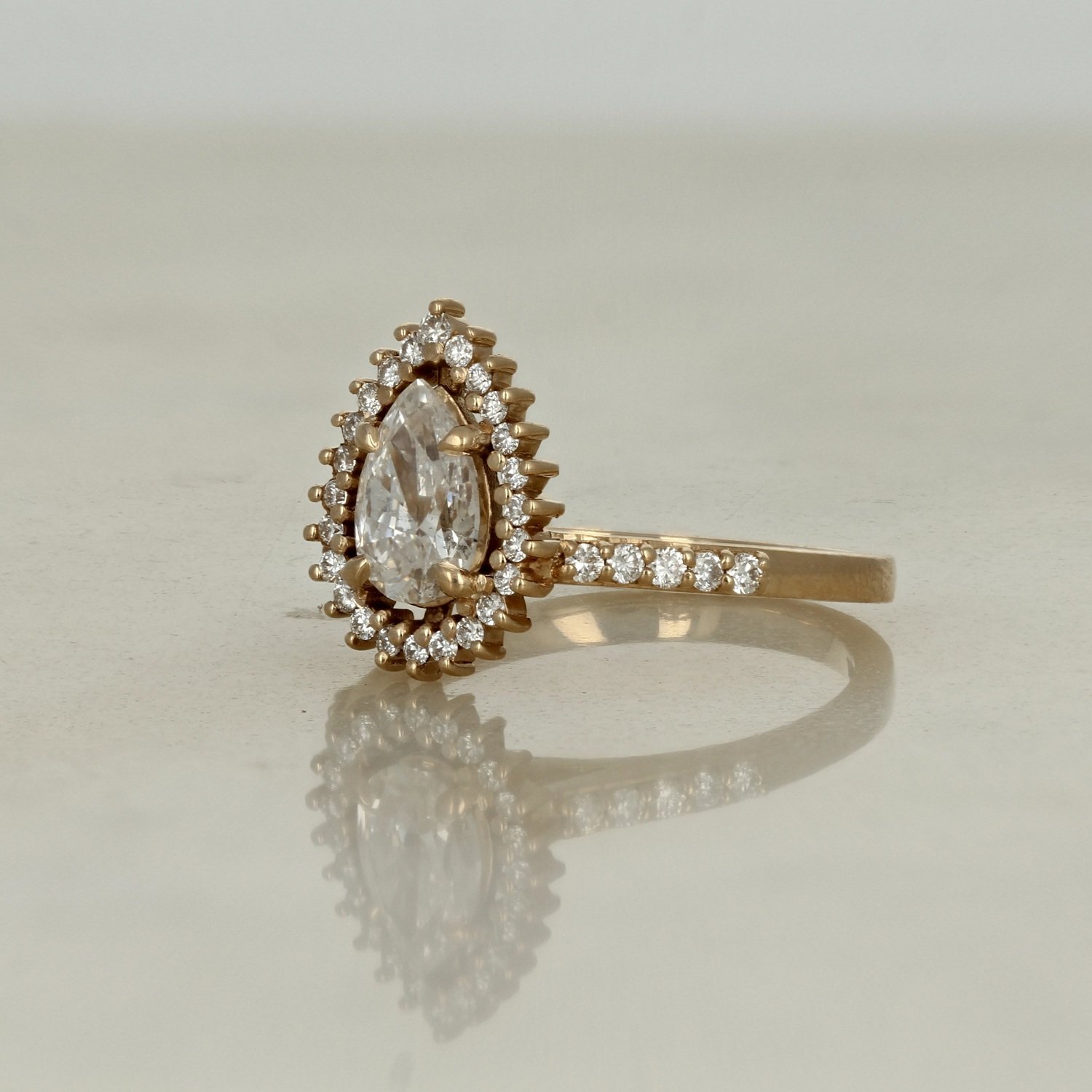 14k yellow gold pear shaped diamond accented halo engagement ring