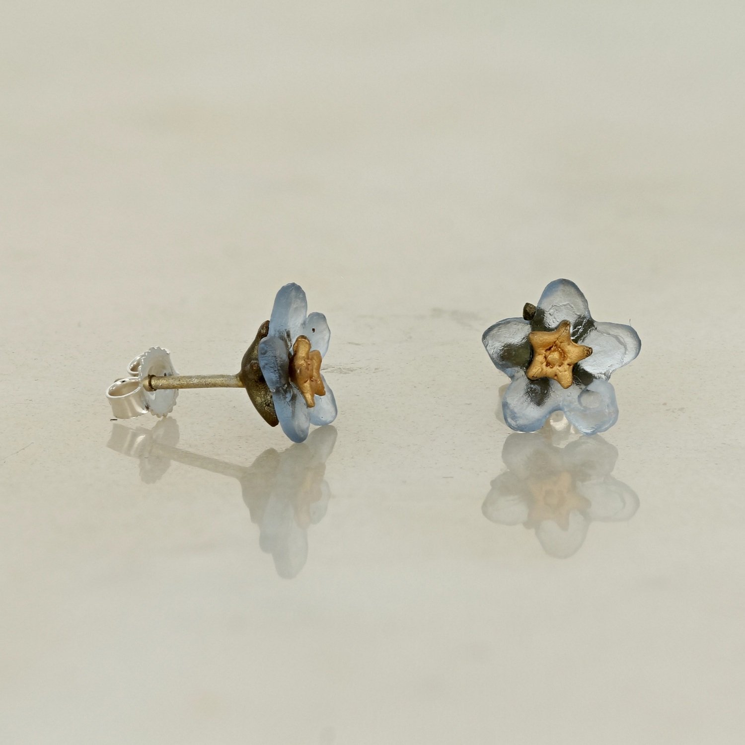 bronze patina cast glass blue flower forget me not stud earrings