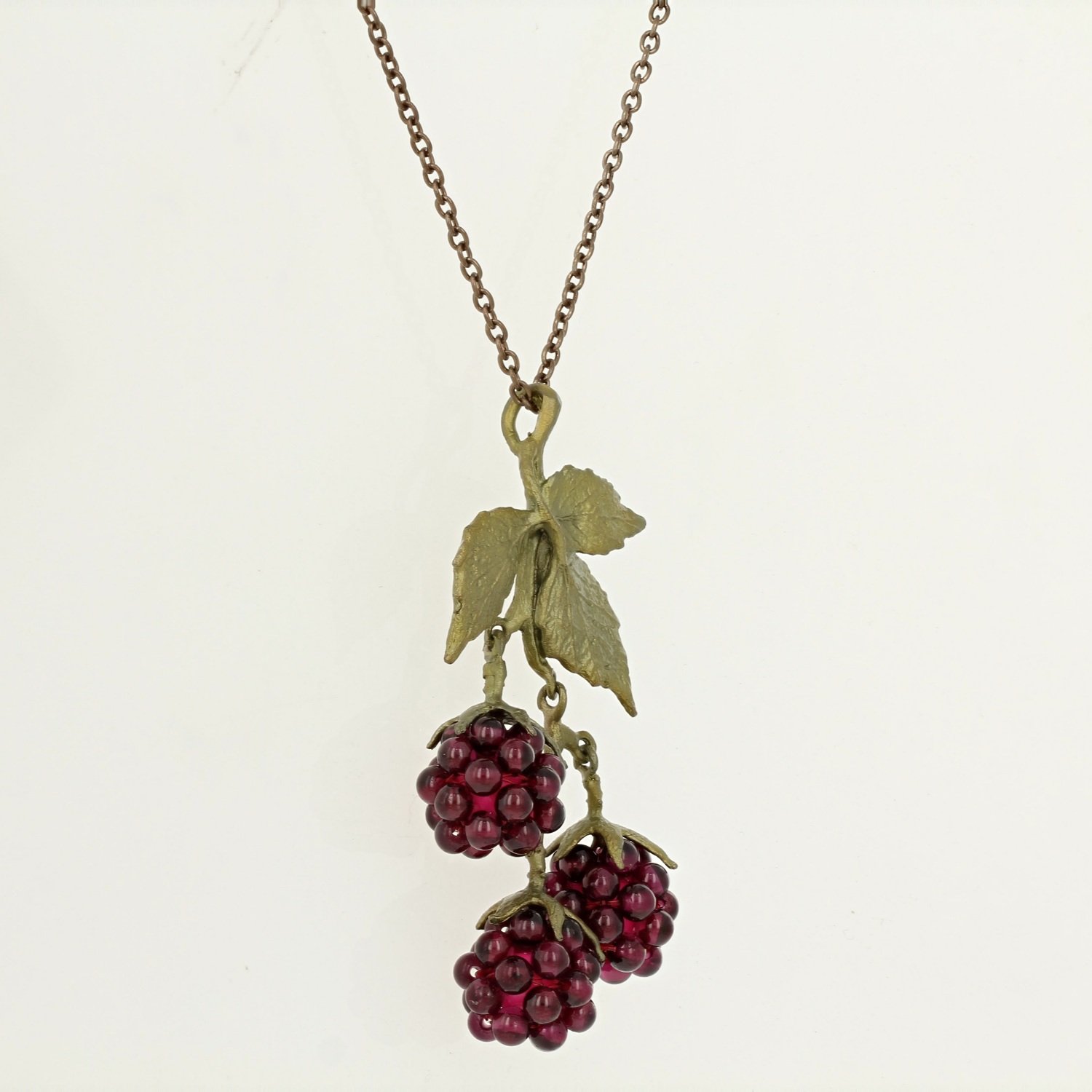 bronze patina garnet raspberry necklace pendant