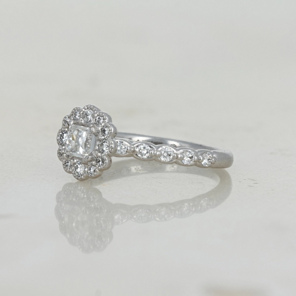 white gold princess cut accented flower Canadian diamond engagement ring