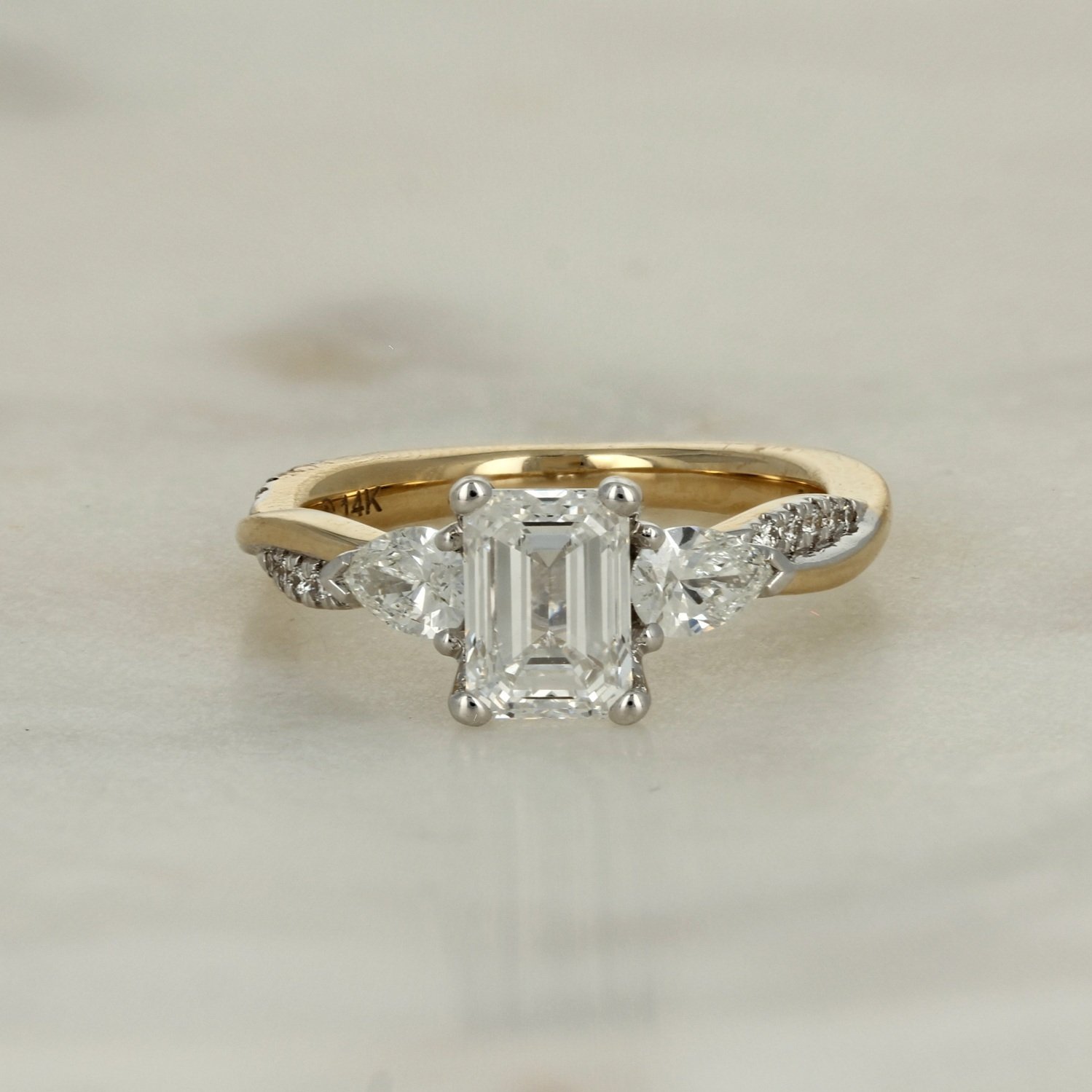 14k two tone yellow gold white gold emerald cut lab grown diamond accented twisted band engagement ring