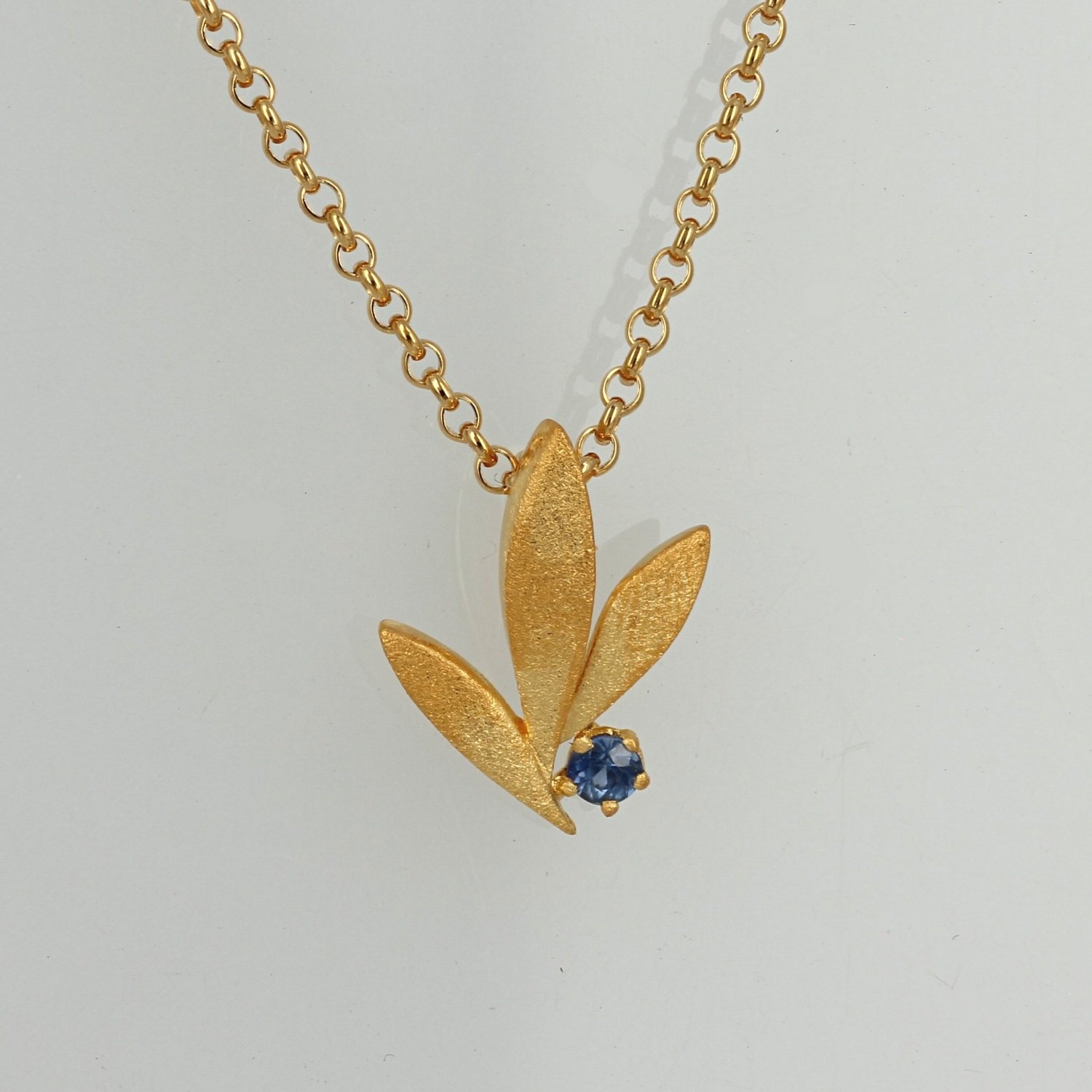sterling silver with gold plate brushed finish leaf blue sapphire necklace pendant