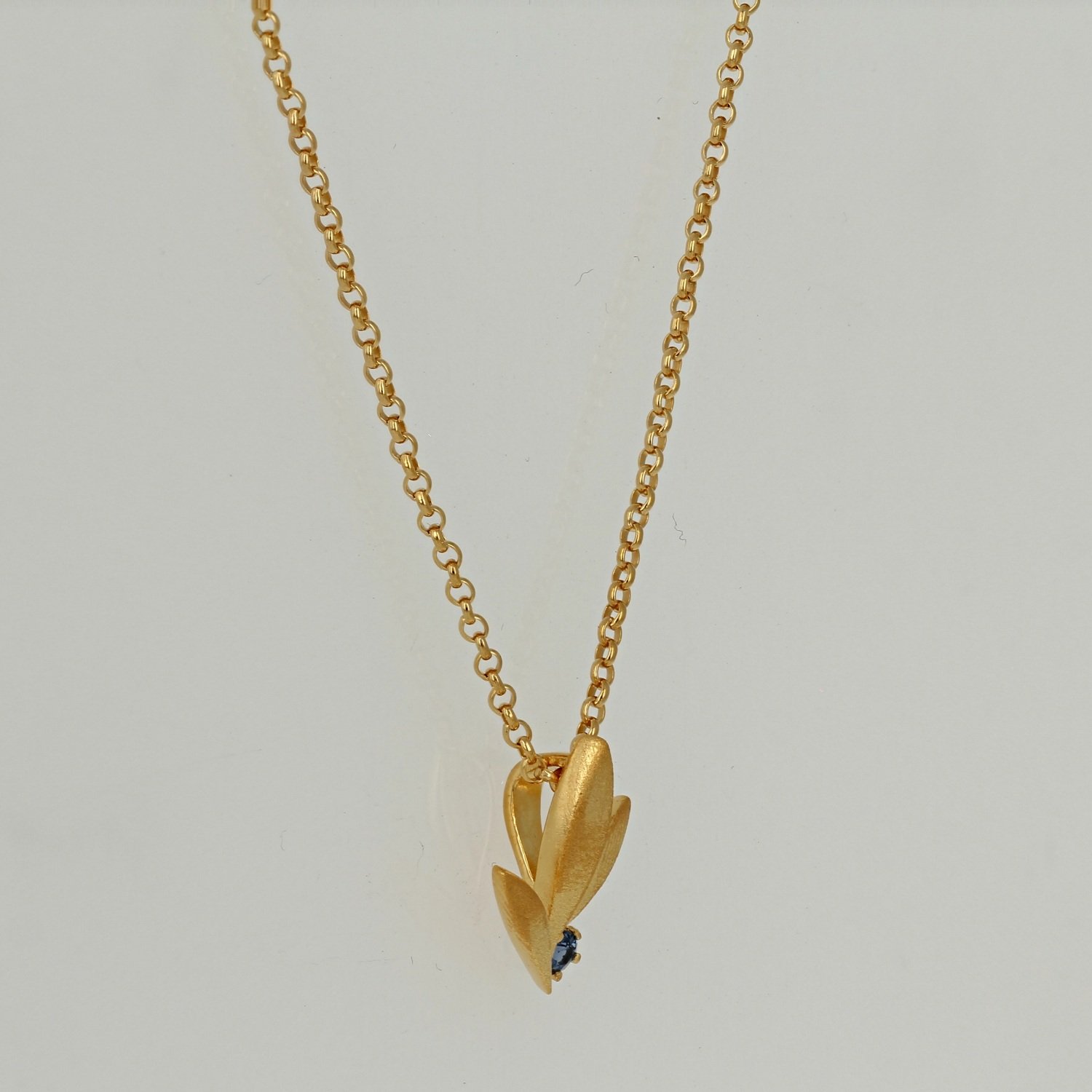 sterling silver with gold plate brushed finish leaf blue sapphire necklace pendant