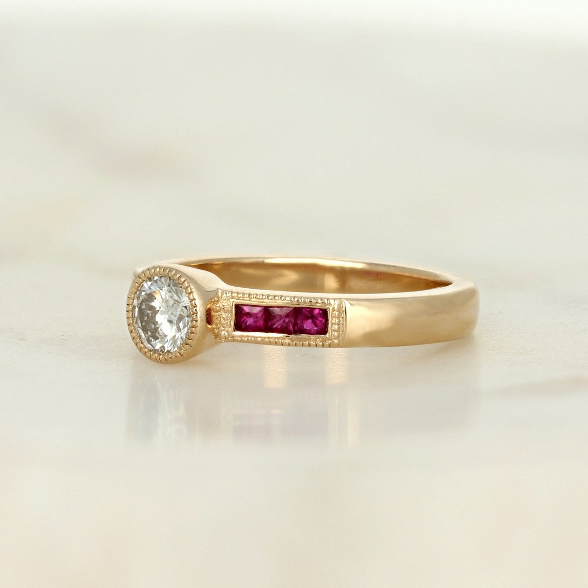 14k yellow gold round diamond accent channel set milgrain princess cut ruby engagement ring