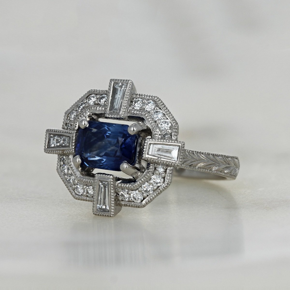 platinum emerald cut sapphire art deco diamond accented ring