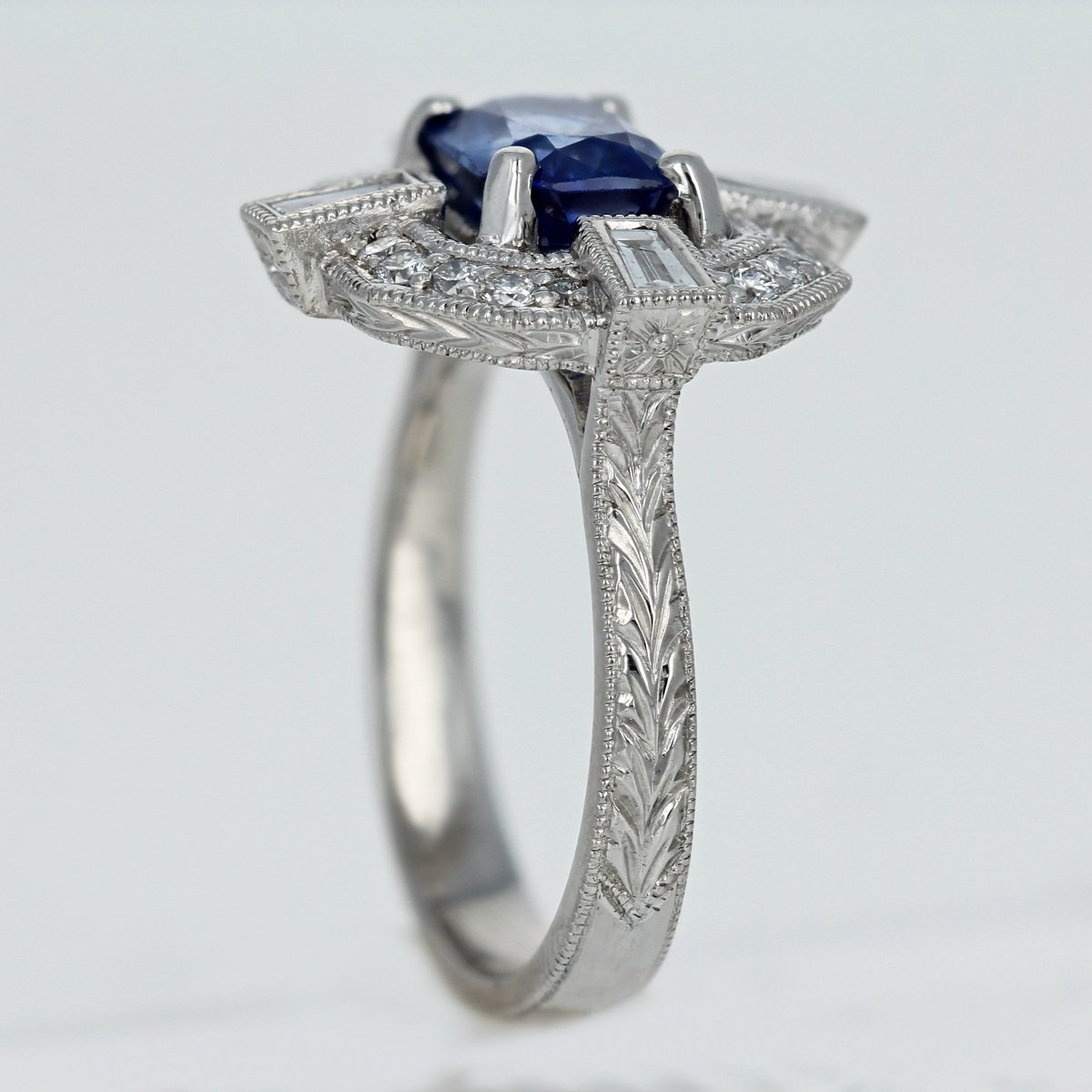 platinum emerald cut sapphire art deco diamond accented ring