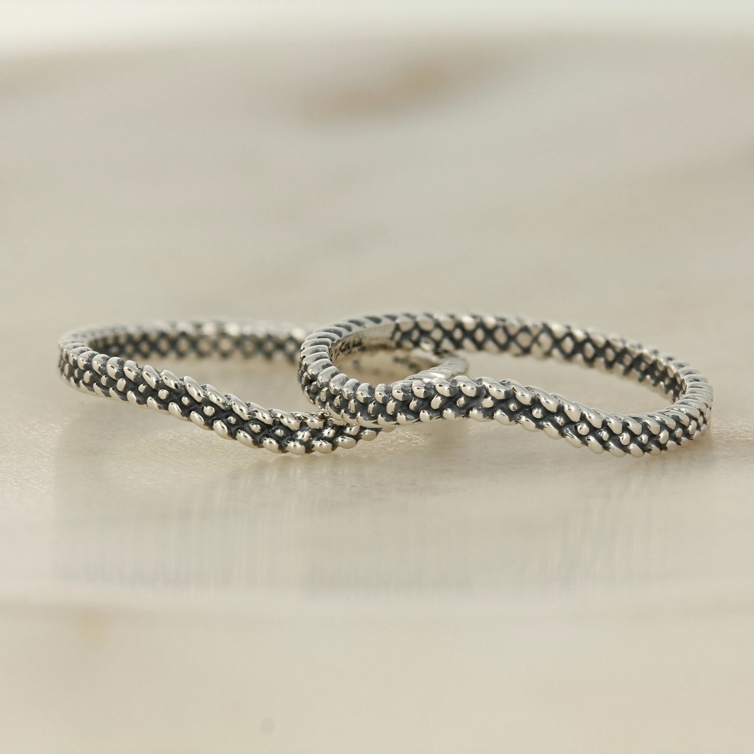 oxidized sterling silver 10k yellow gold moissanite trinity braided three ring contour band set