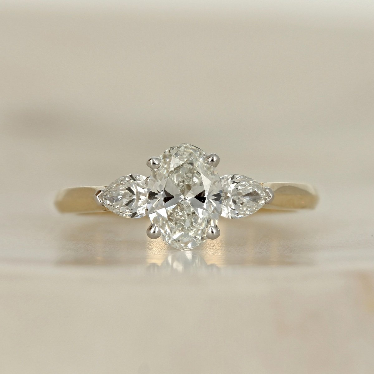 14k two tone yellow white gold oval Canadian diamond accented three stone engagement ring