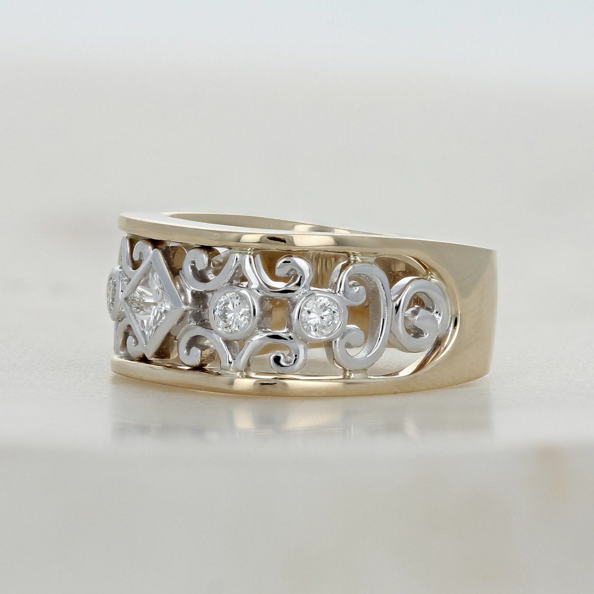 14k two tone yellow and white gold princess cut diamond scroll ring