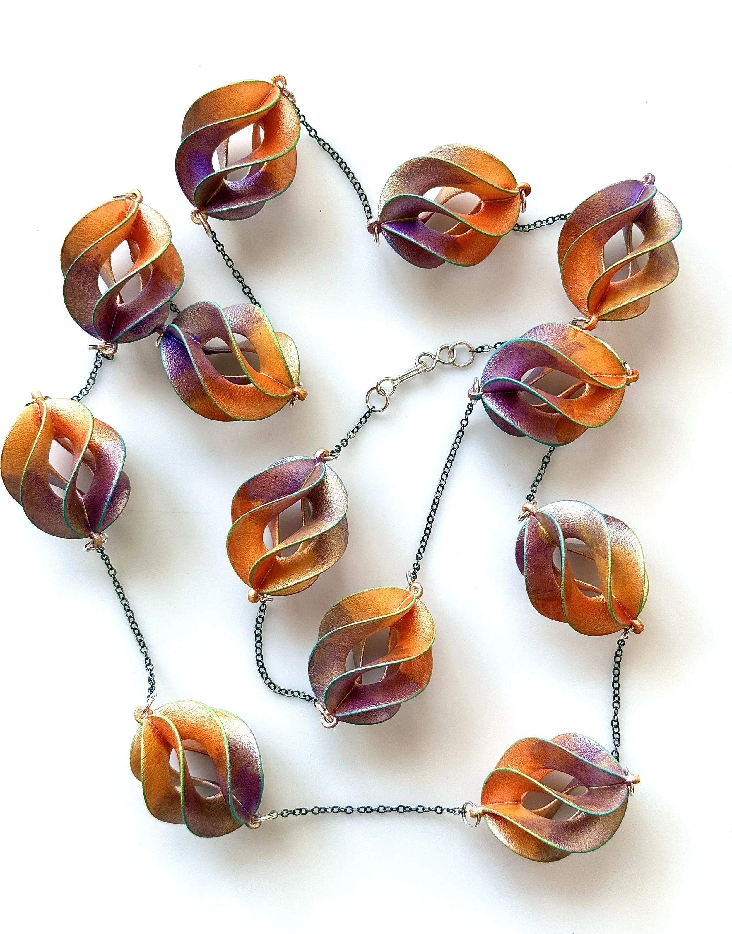 Star Ruby with 12 links and sterling chain
length can be varied   $875