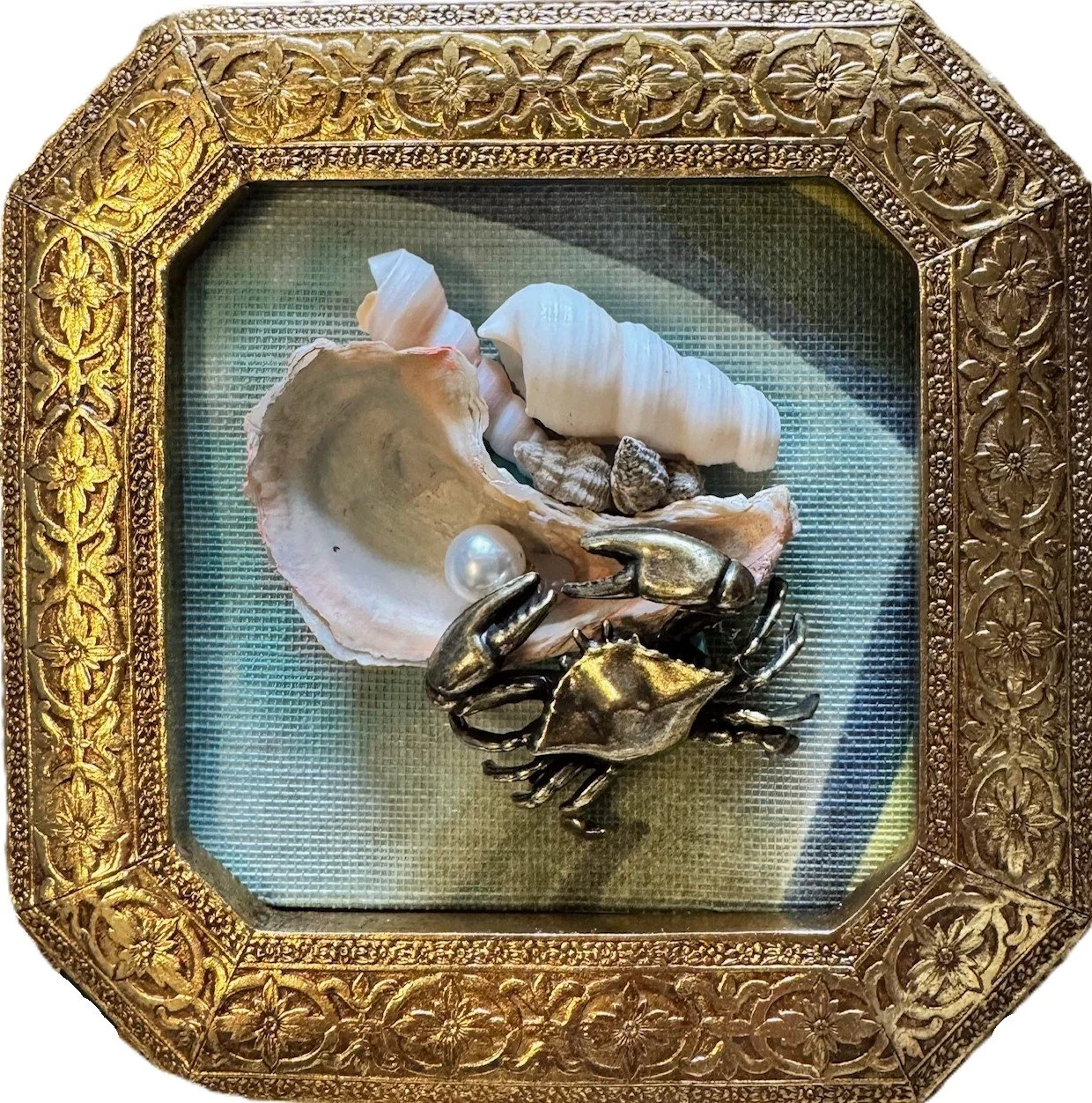 Crab finds oyster with pearl, $65