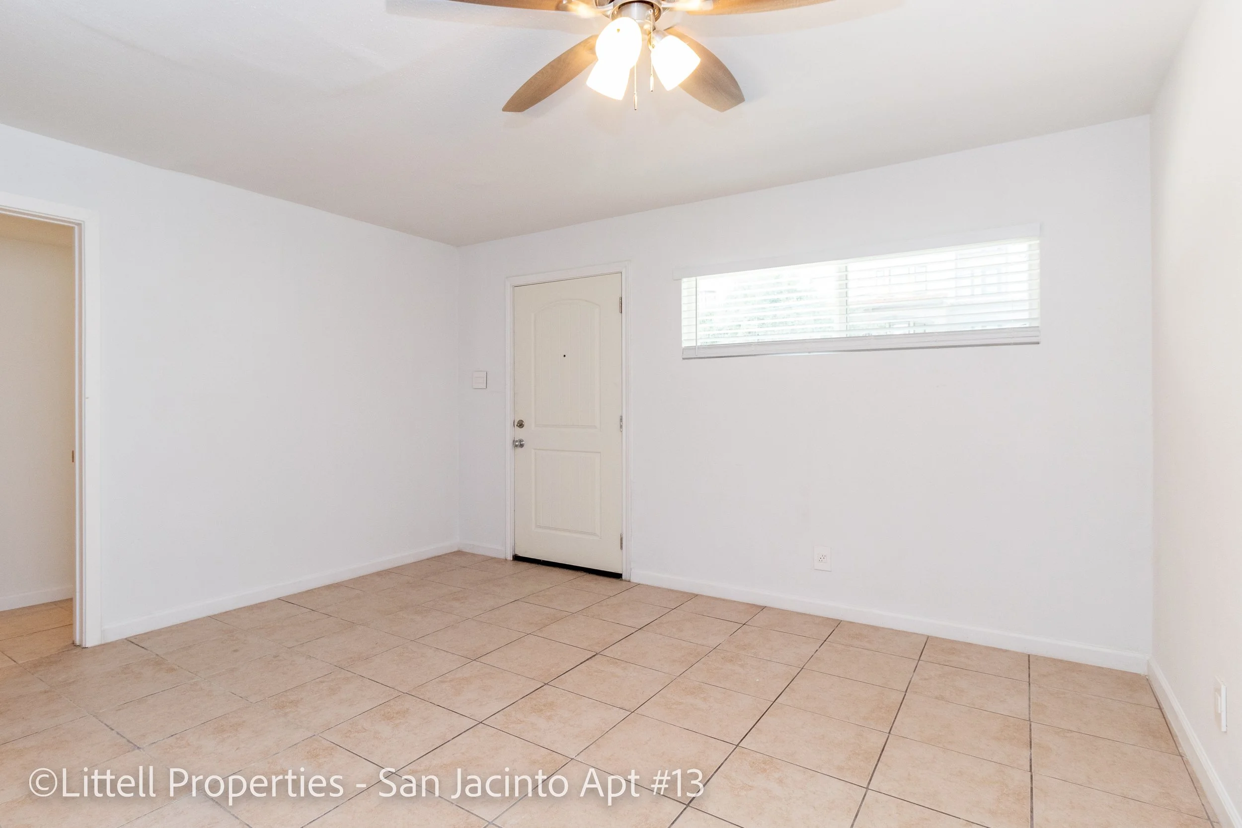  Living area and view of the front door entrance  