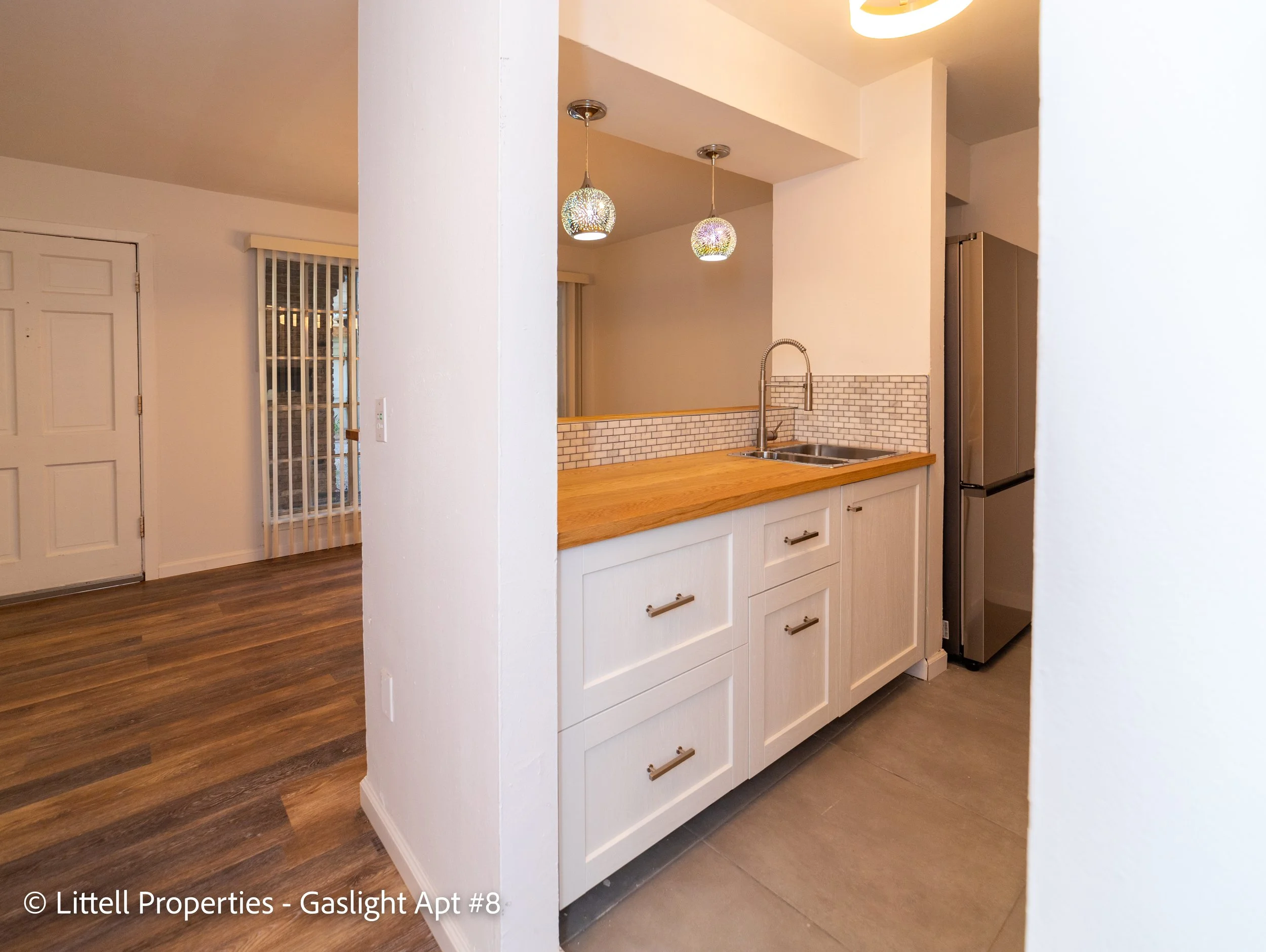  The kitchen has new cabinetry and drawers for storage. There is ample countertop space for those who love to cook!  