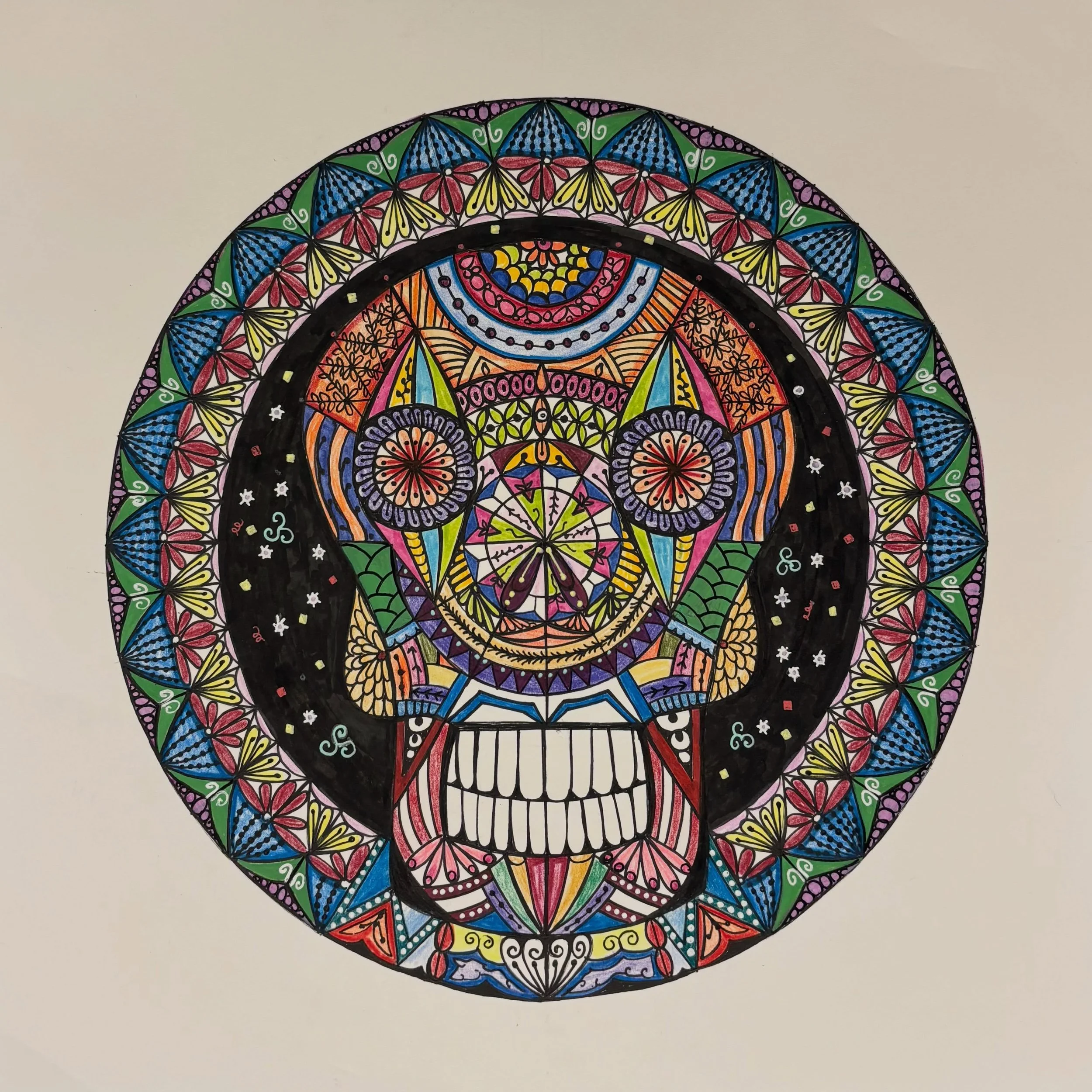 This one is really funky. Started out as a sugar skull but ended up with doodles and graffiti all over it. Doodling is so addictive and relaxing. #femandala #SugarSkull