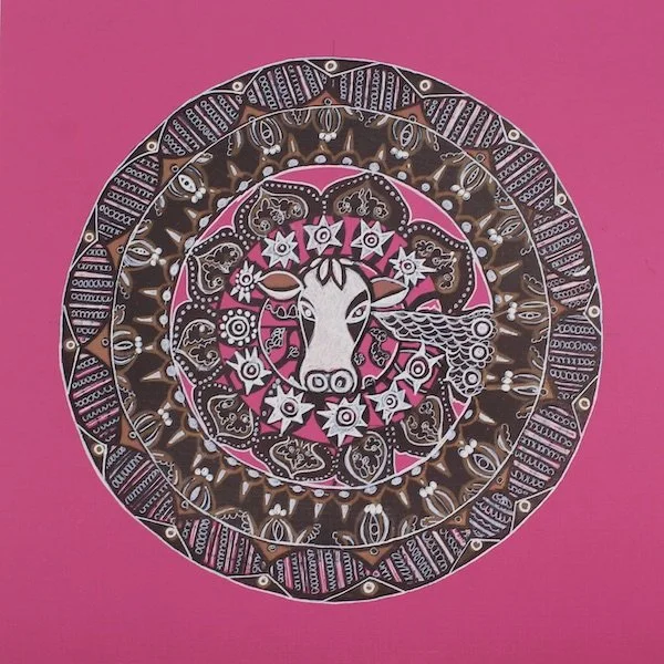 Decorative circular artwork with a horse's head at the center, surrounded by intricate patterns and floral designs, set against a pink background.