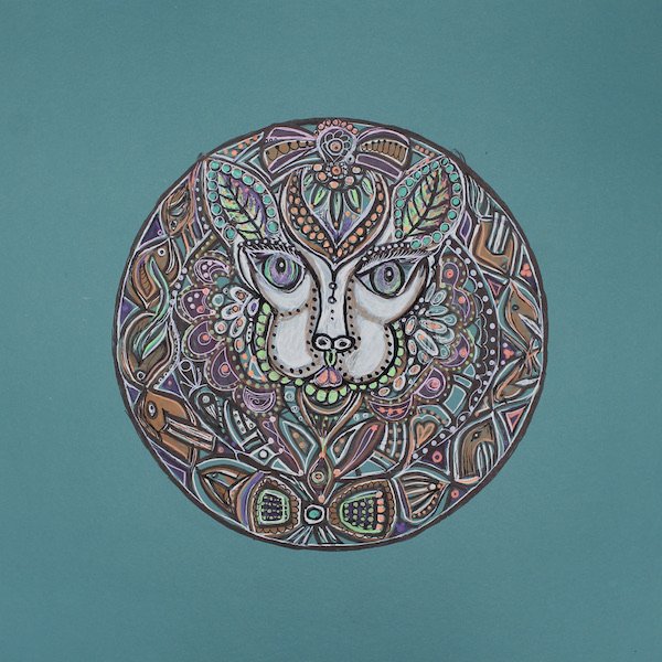 white-cat-with-leaves-and-spring-colors-on-turquoise-background-mandala-femandala.jpeg