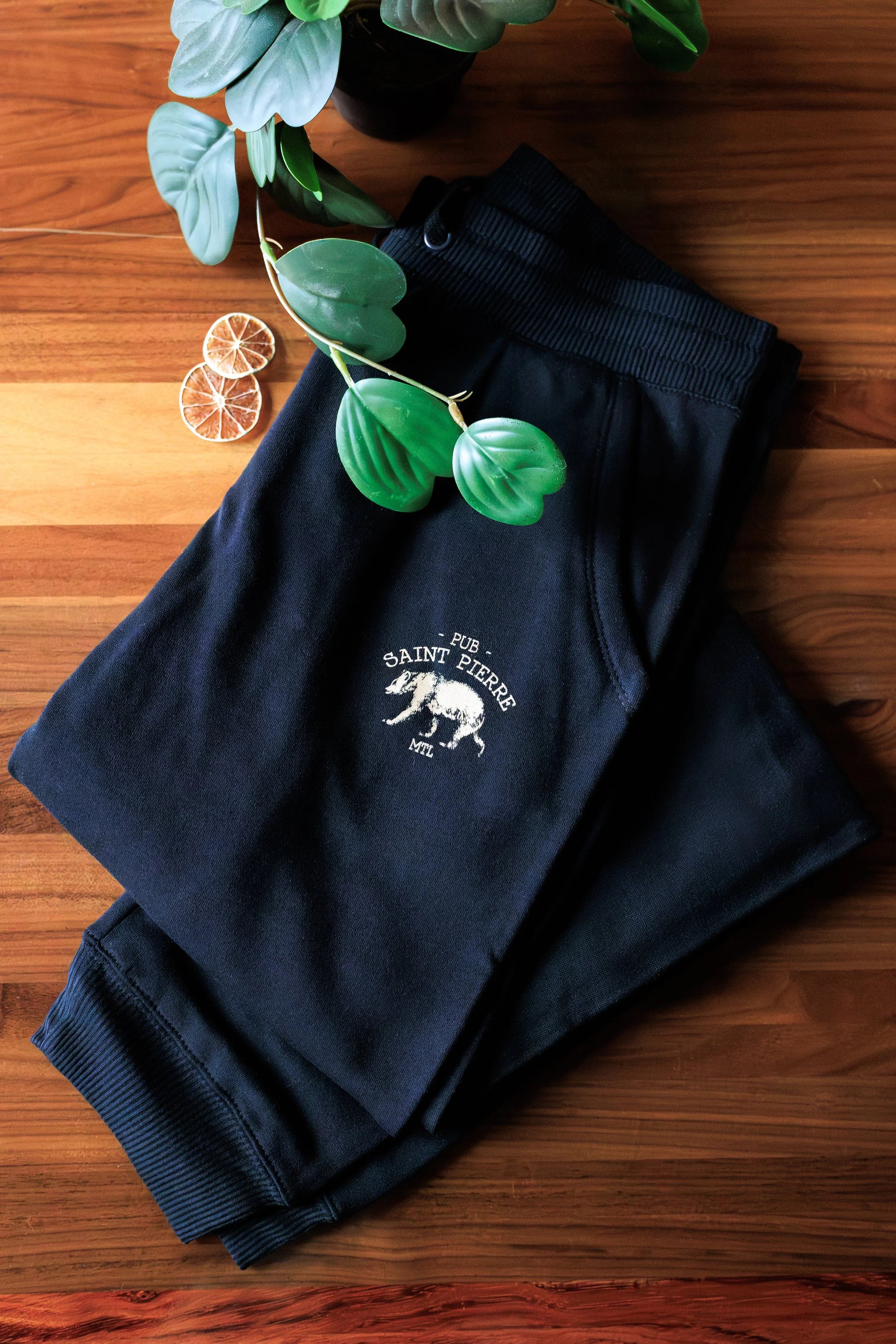 Joggers on wood with decor.jpg